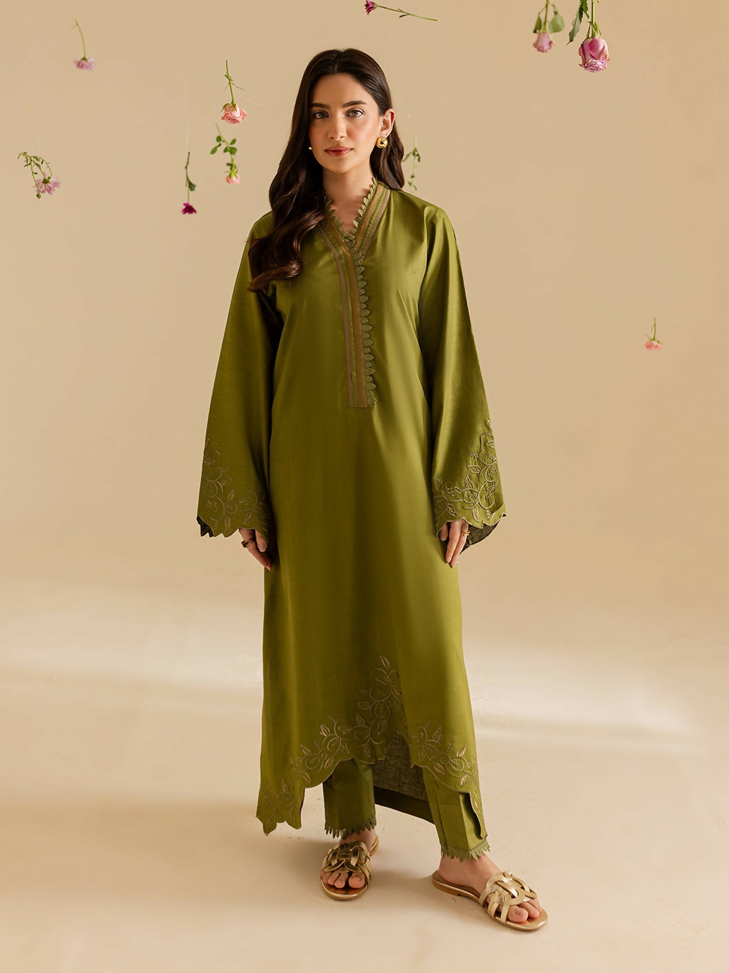 Mahnur stitched 2-piece pret suit featuring a lawn shirt with classic detailing and full sleeves, paired with a plain trouser.