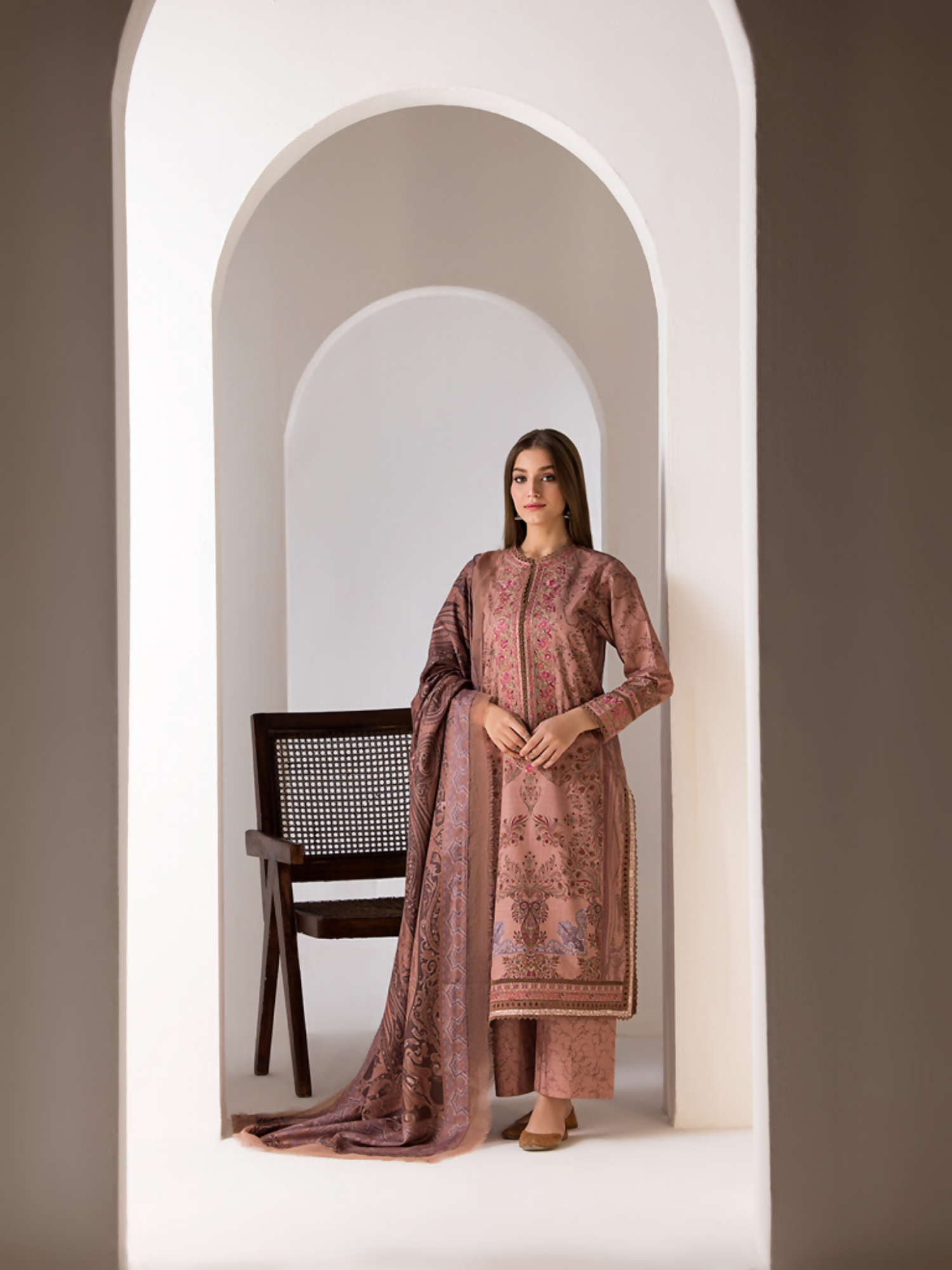 Unstitched 3-piece suit by Sobia Nazir with printed khaddar shirt, embroidered organza patches, printed trouser, and blended wool shawl.