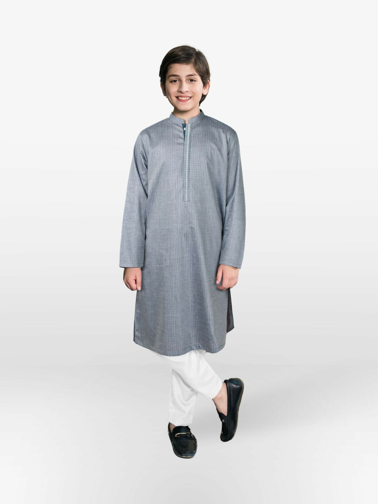 Boy wearing cotton stitched kurta with mandarin collar, full sleeves, and regular fit