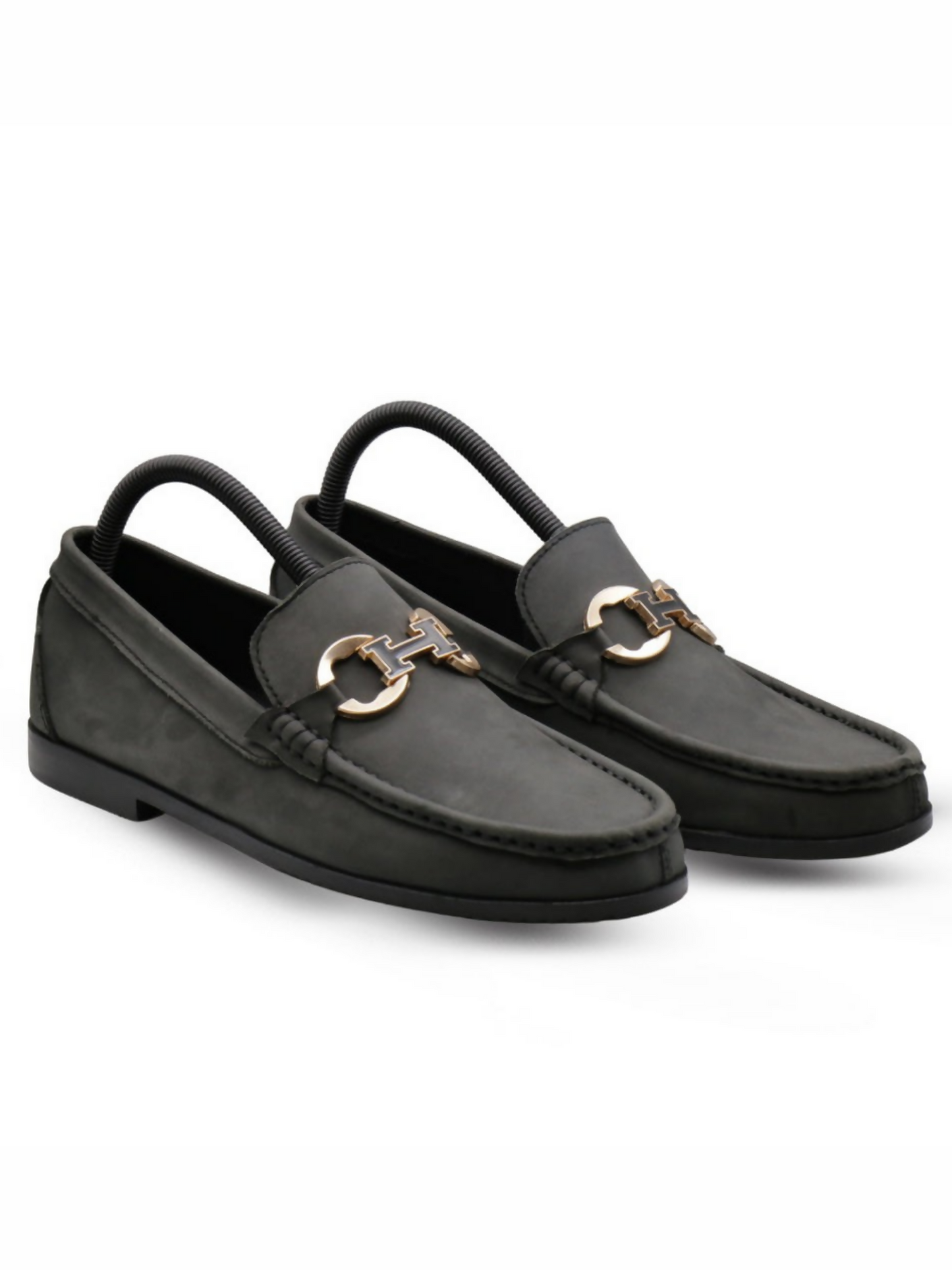Black textured leather loafers with a sleek silhouette and cushioned insoles, perfect for formal and upscale casual wear.