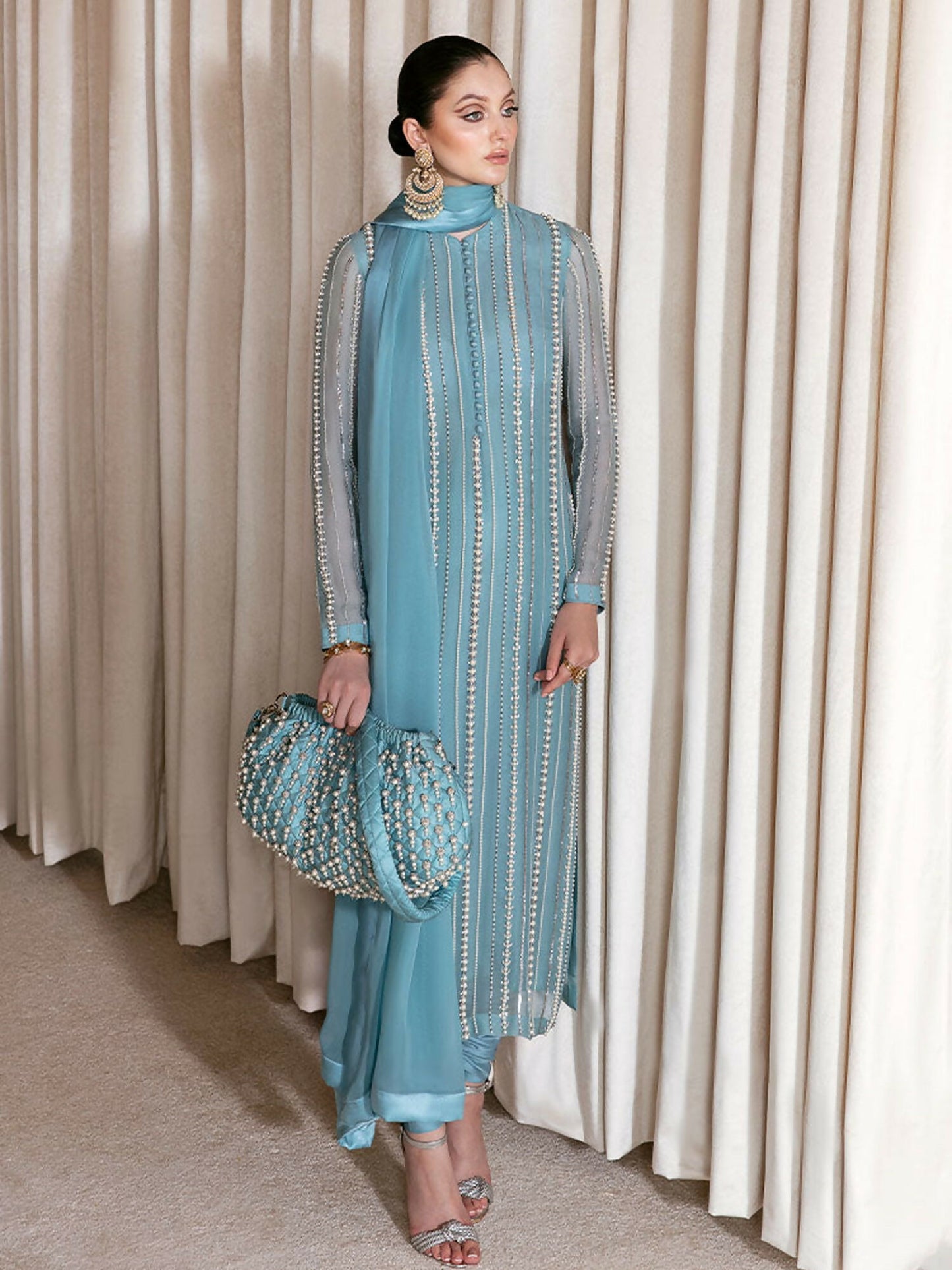 Hussain Rehar ice blue organza shirt with pearl and Swarovski embellishments, raw silk chooridaar, and chiffon dupatta