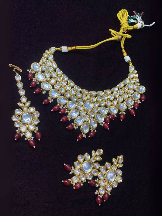 Noor Bilal Indian Kundan bridal set with heavy necklace, earrings, bindi, and backside minakari detailing.