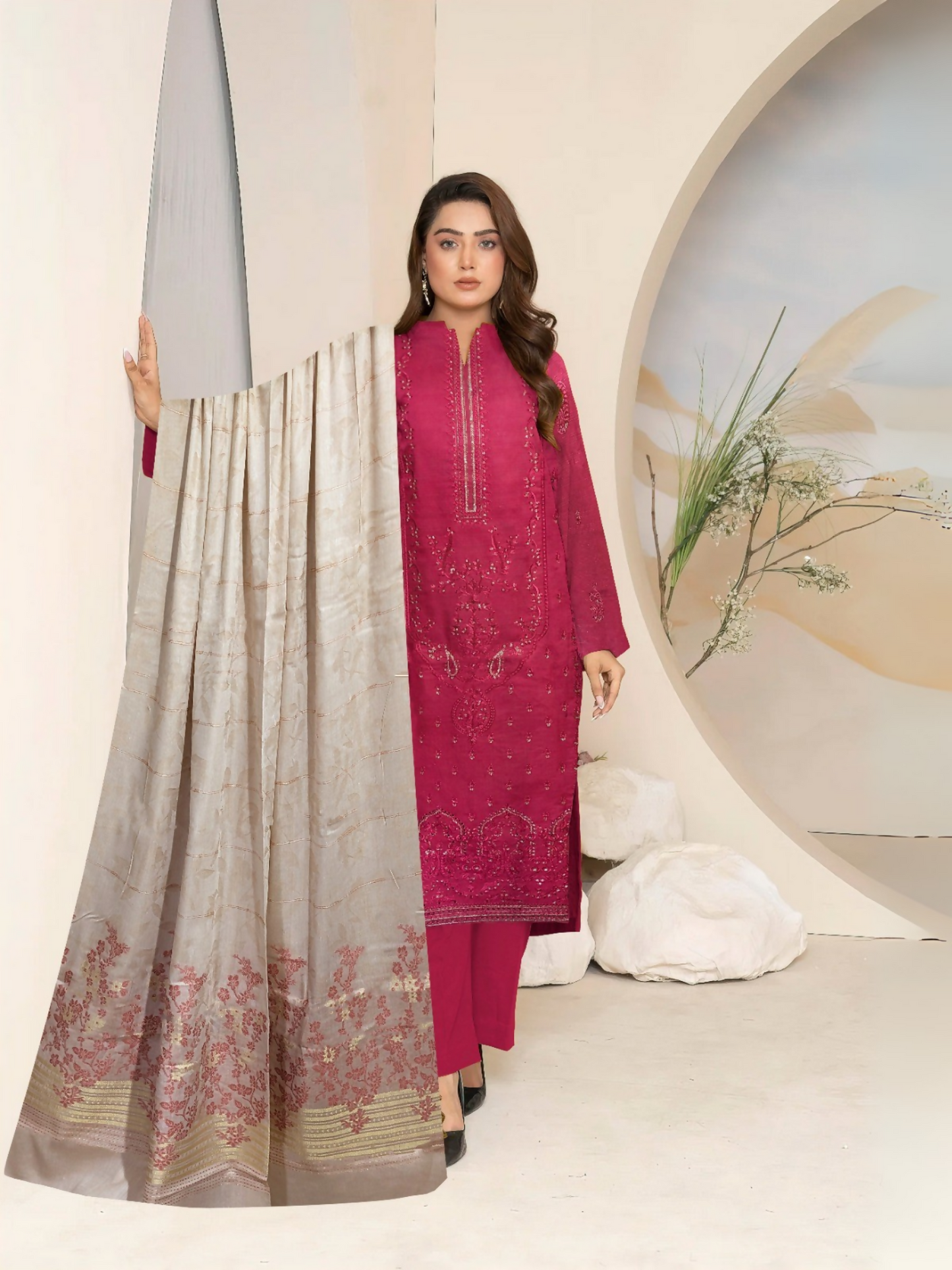 Elegant embroidered lawn suit with jacquard dupatta and cotton trouser.