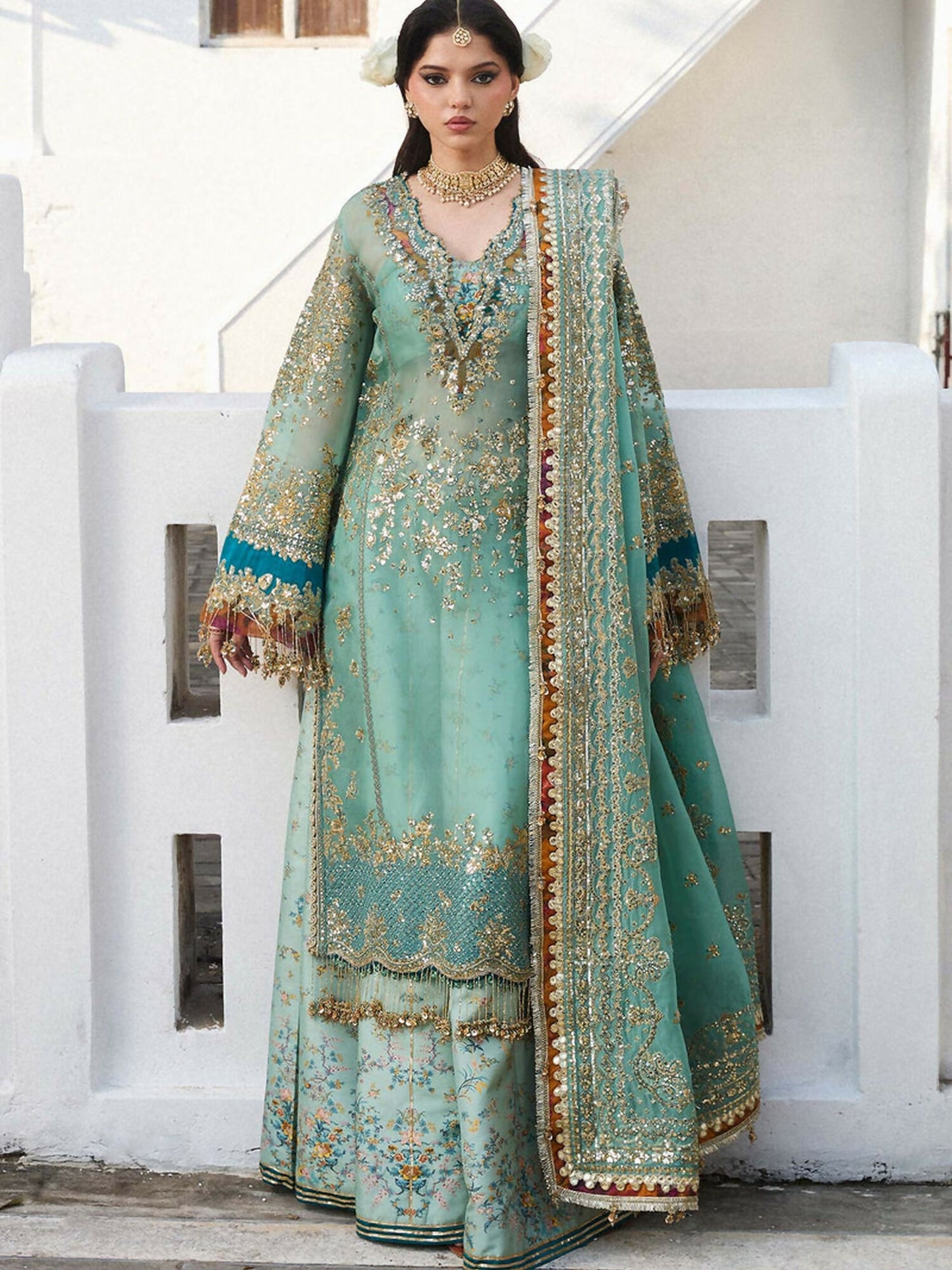 Embroidered organza shirt with sequin-embroidered organza dupatta and digitally printed Korean raw-silk sharara, luxury festive 3-piece set.