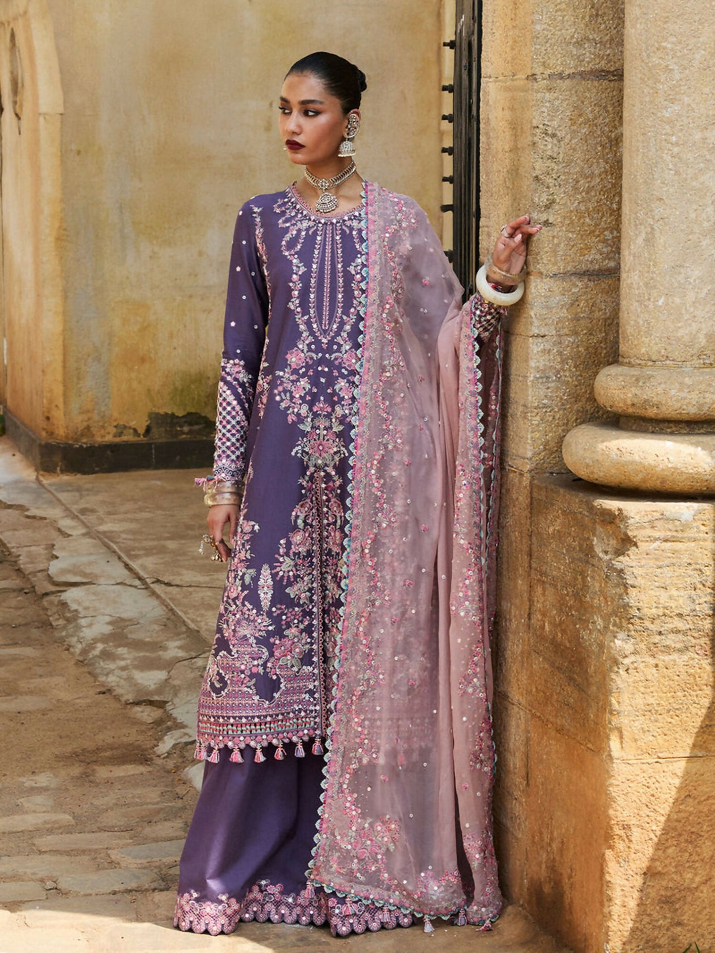 Hussain Rehar unstitched 3-piece suit with embroidered lawn shirt, chiffon embroidered dupatta, and cotton trouser, featuring floral motifs and panni detailing for an elegant traditional look.