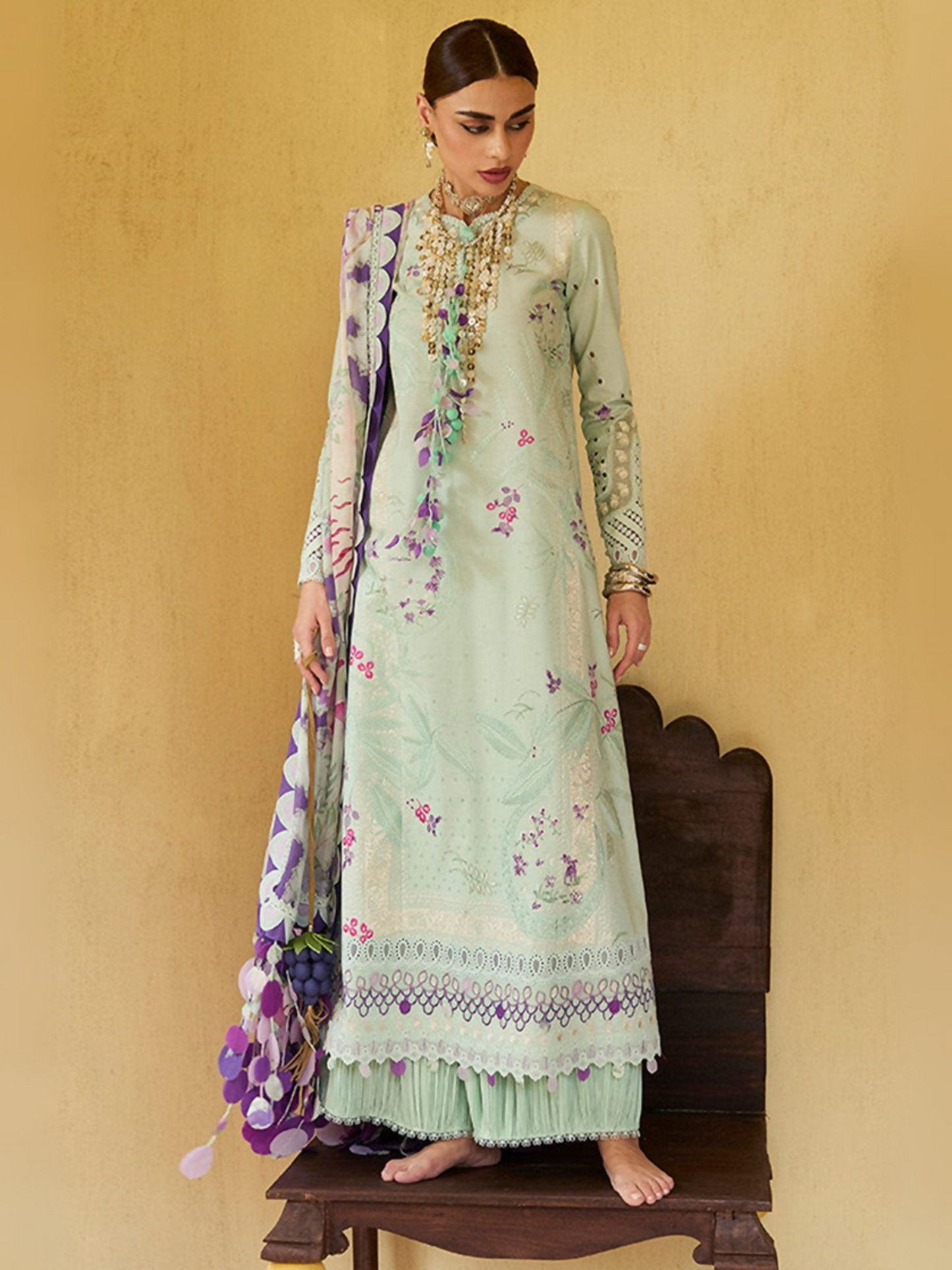 Mint green embroidered lawn outfit by Sana Yasir with intricate embroidery, organza borders, and a digital printed dupatta.