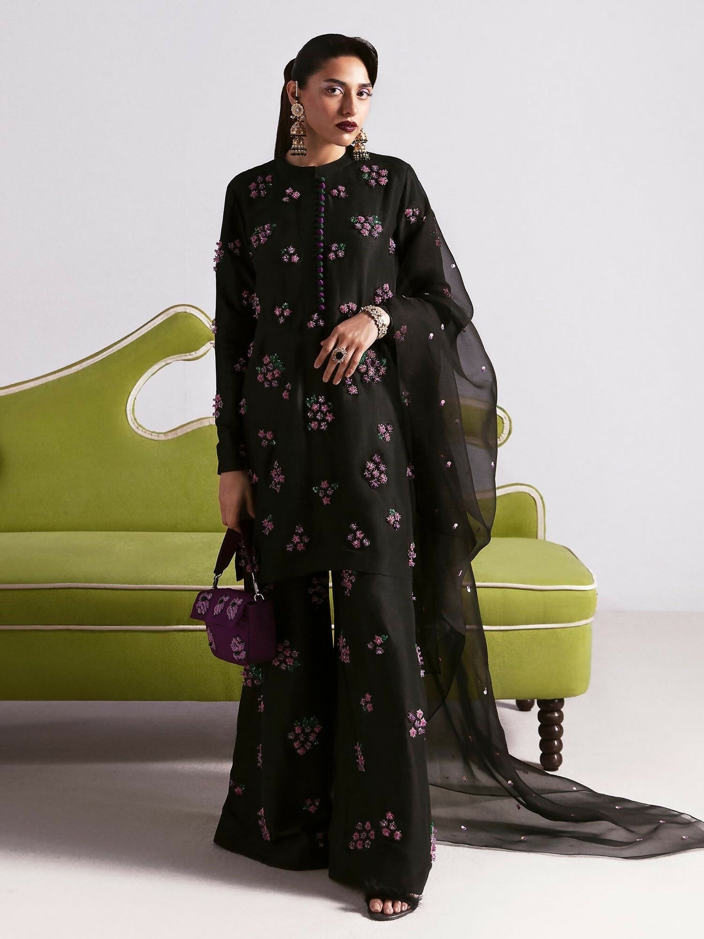 Hussain Rehar stitched 3-piece suit featuring a black raw silk embellished shirt with sequins and multicolored bugle beads, paired with raw silk palazzo pants and organza dupatta.