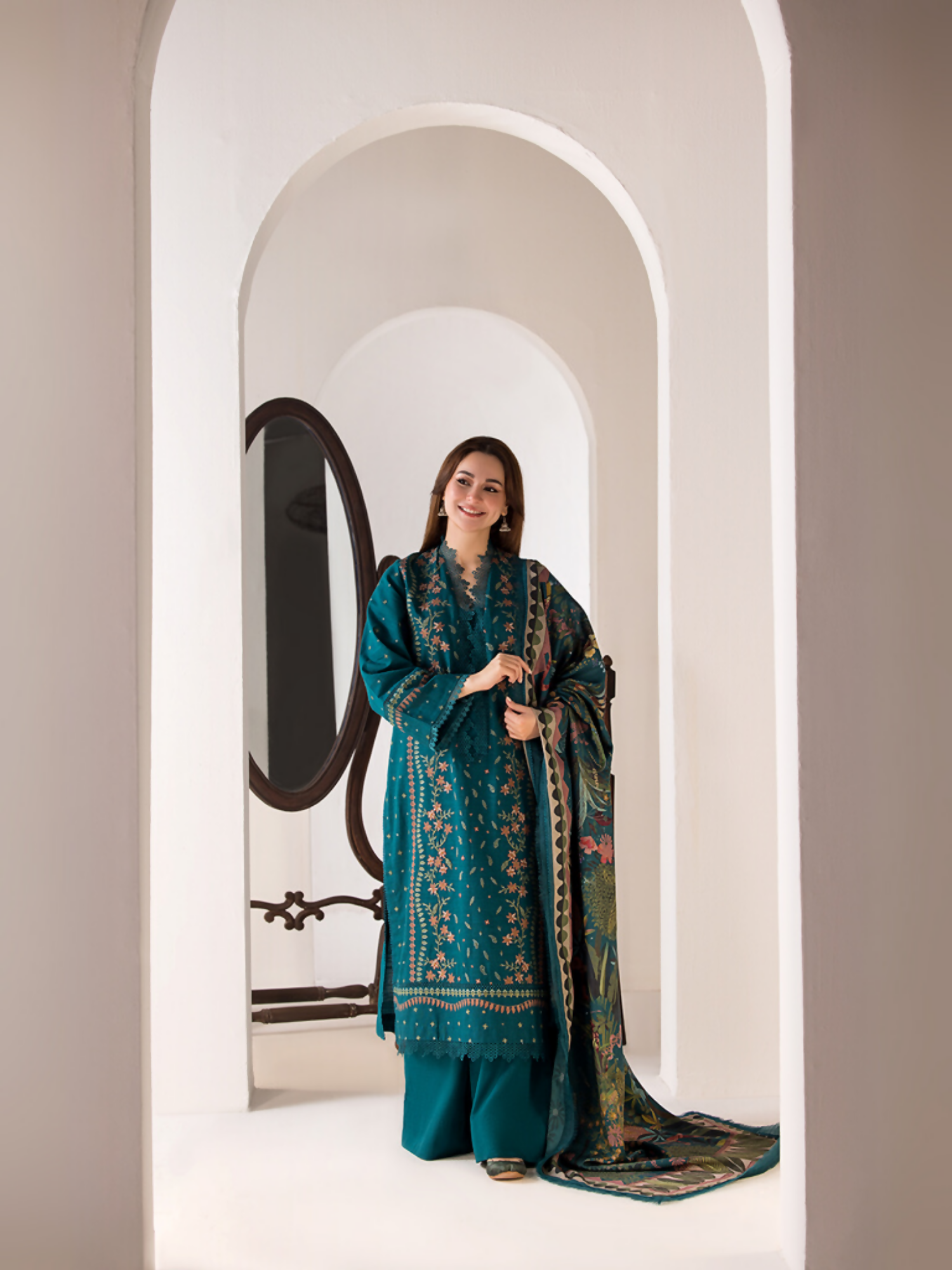 Unstitched 3-piece suit by Sobia Nazir with embroidered khaddar shirt, dyed trouser, and printed marina twill shawl.