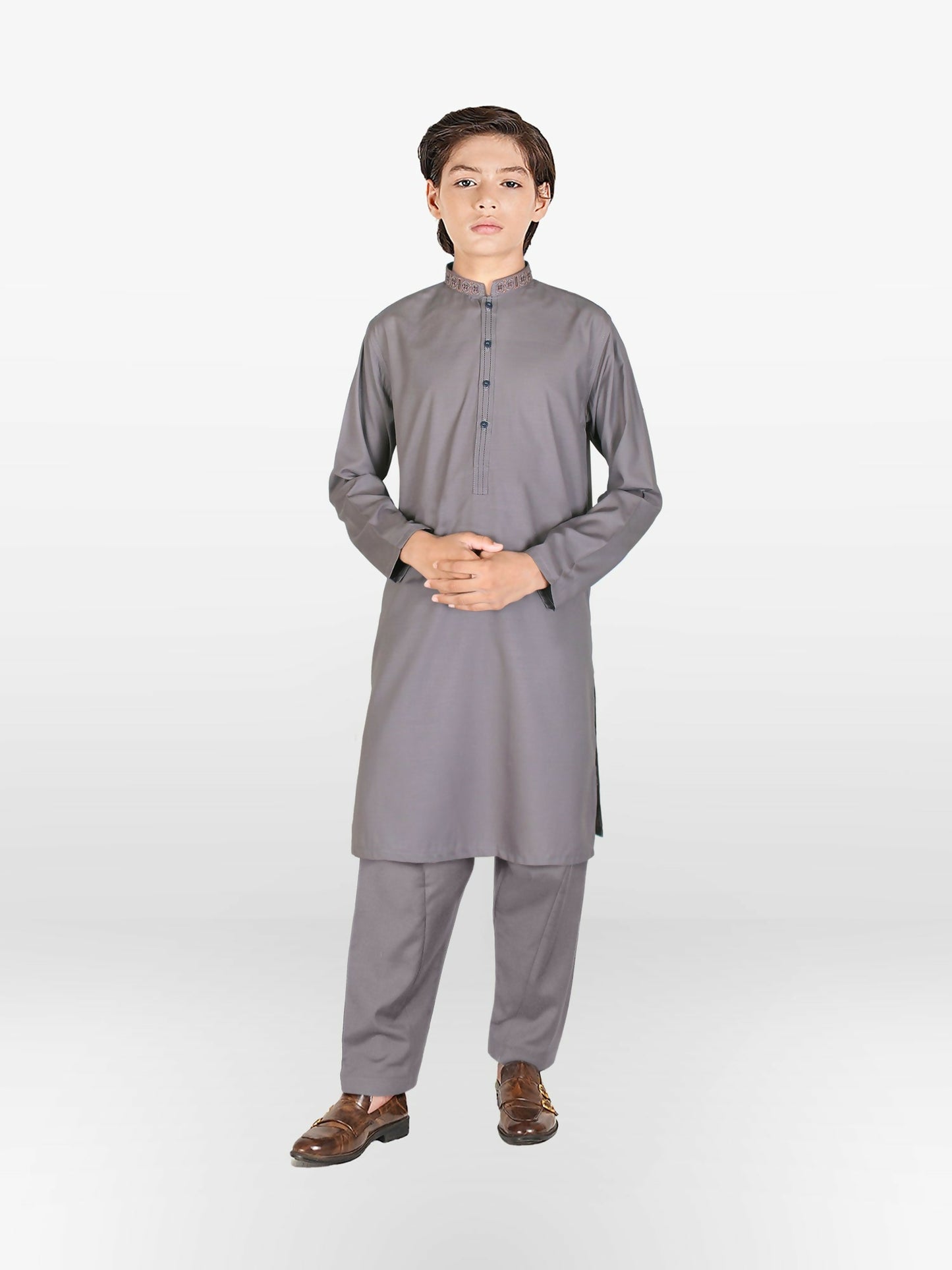 Boy wearing grey cotton kurta shalwar with subtle embroidery on mandarin collar, full sleeves, and regular fit