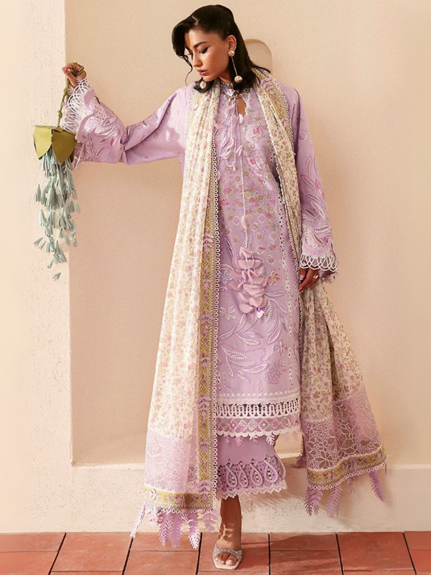 Mauve purple embroidered lawn ensemble by Sana Yasir with organza borders, silk dupatta, and cambric trousers.
