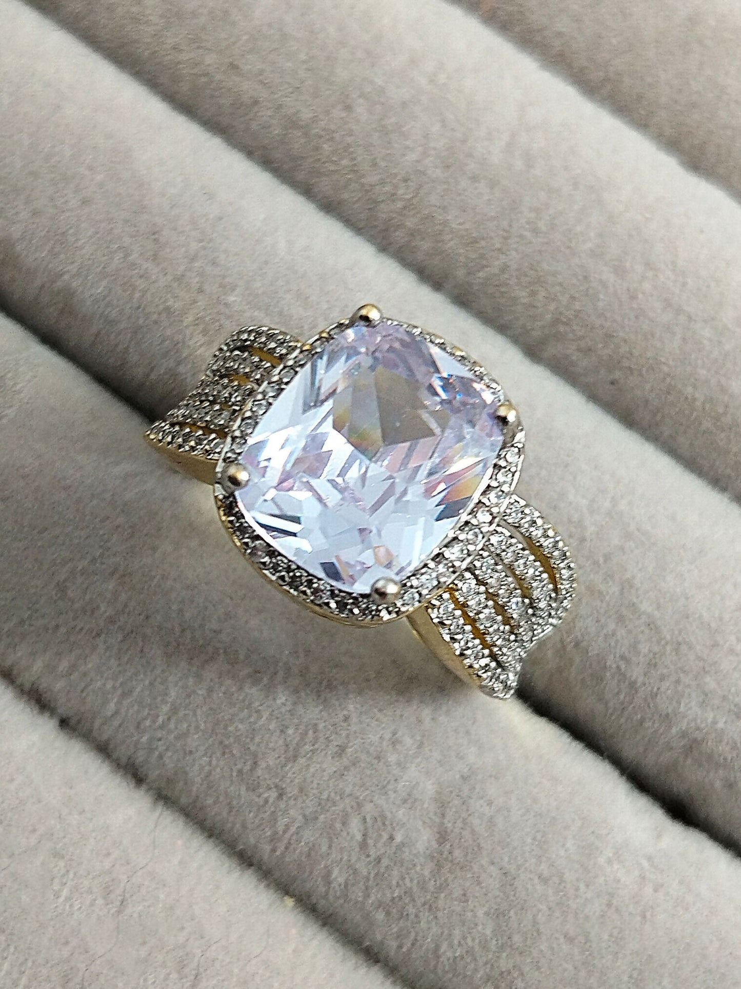 H&A Jewellery 18K gold polished cushion-cut zircon solitaire ring with halo and split shank design