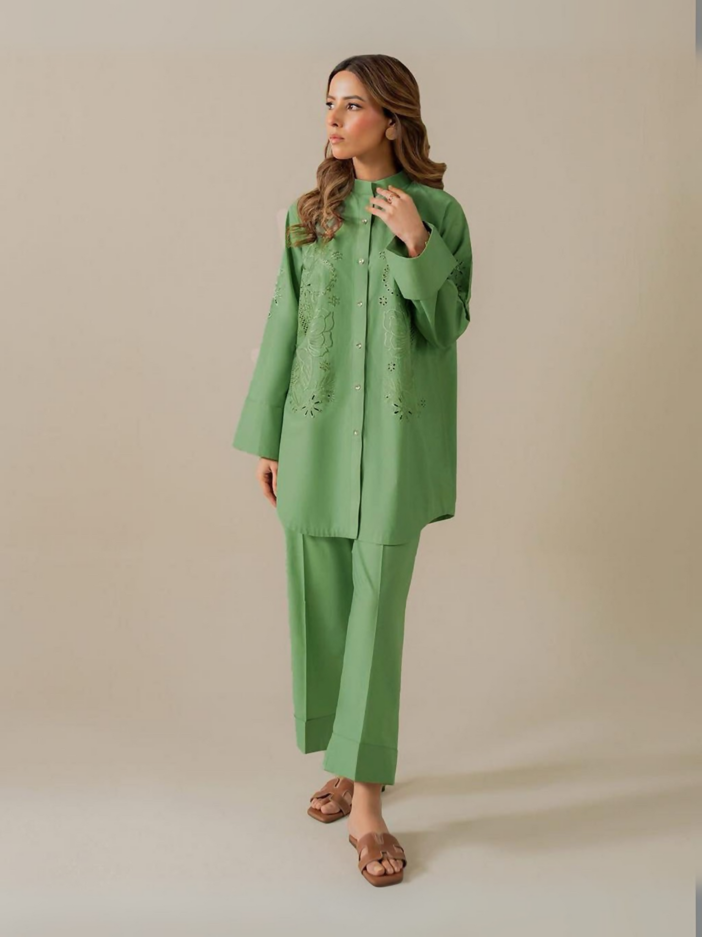 Trends Forever Karam Collection green lawn stitched 2-piece suit with embroidered shirt and plain trouser, displayed in a soft studio light.