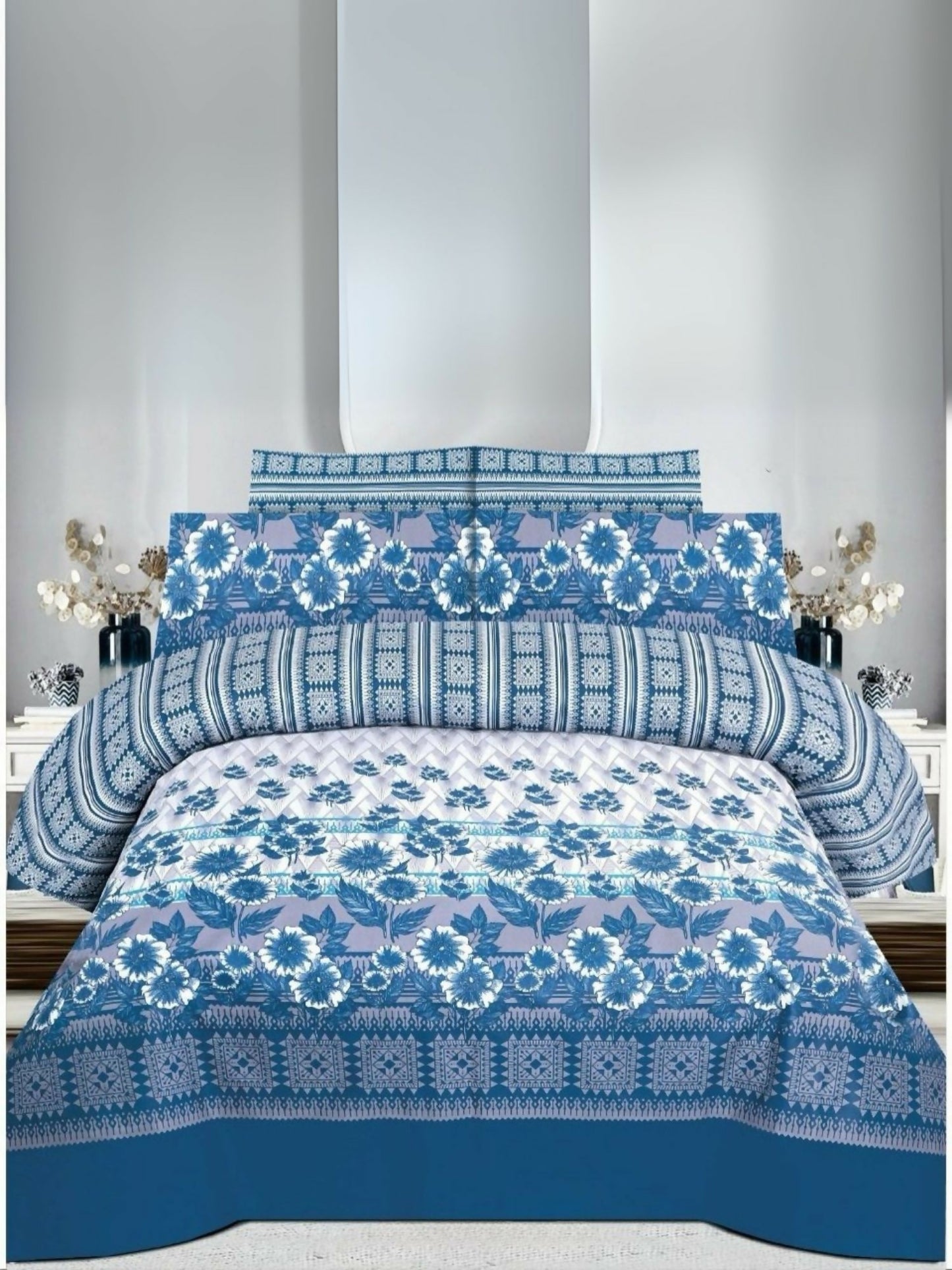 Danier 6pcs comforter set with blue and white design – includes comforter, bedsheet, and four pillow covers.