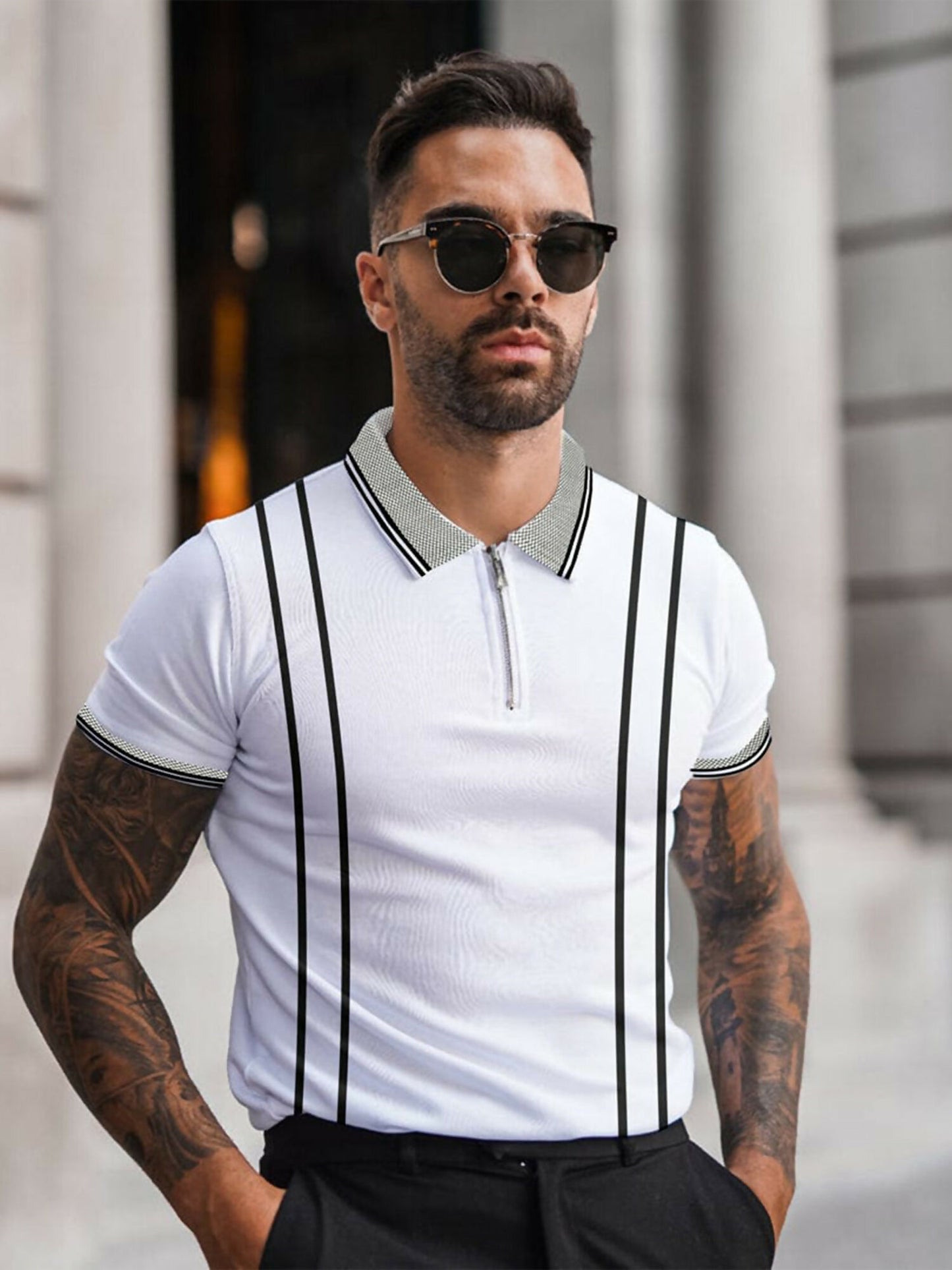 Men's combed cotton pique polo shirt with honey-combed texture, jacquard knit premium collar and cuffs, front quarter zip placket, stitched vertical stripes, and fine side vents.