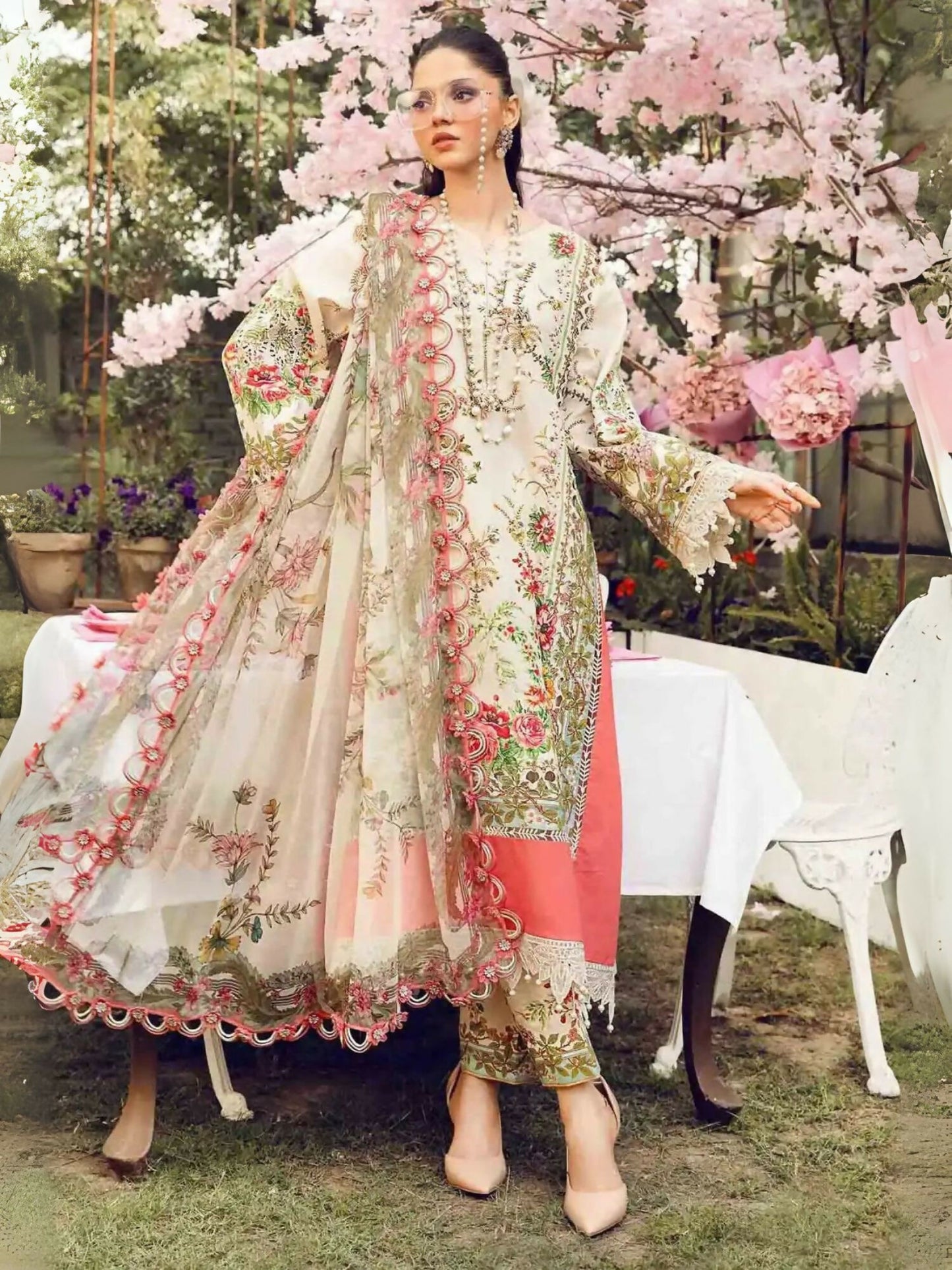 Unstitched 3-piece Maria.B lawn suit with embroidered organza patti and printed chiffon dupatta.