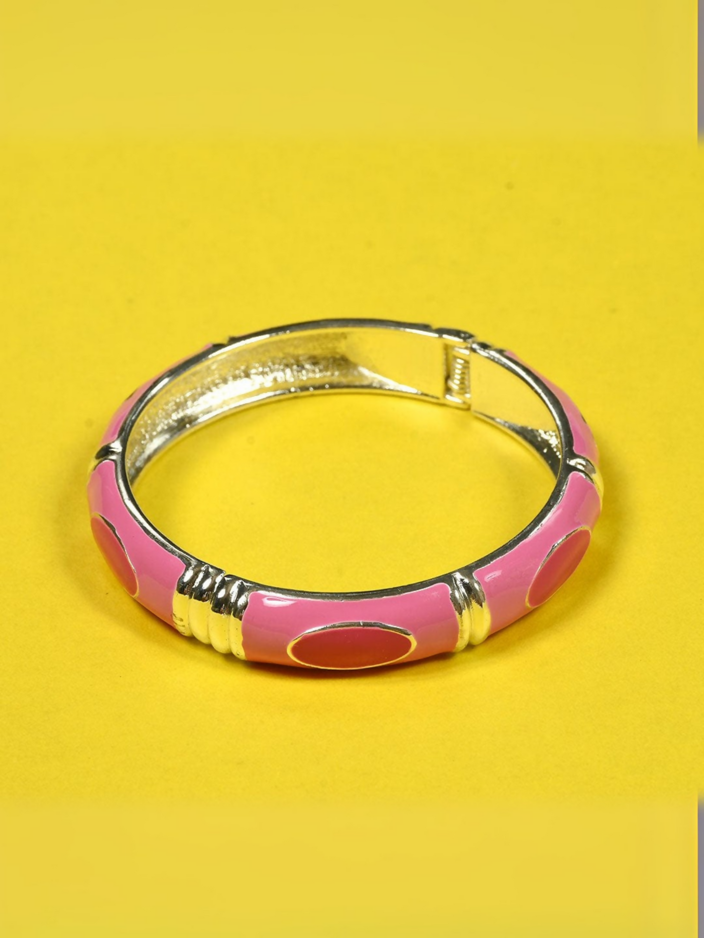 Elegant enamel clutch bangle with gold accents, crafted from tarnish-resistant material for a sleek everyday look.