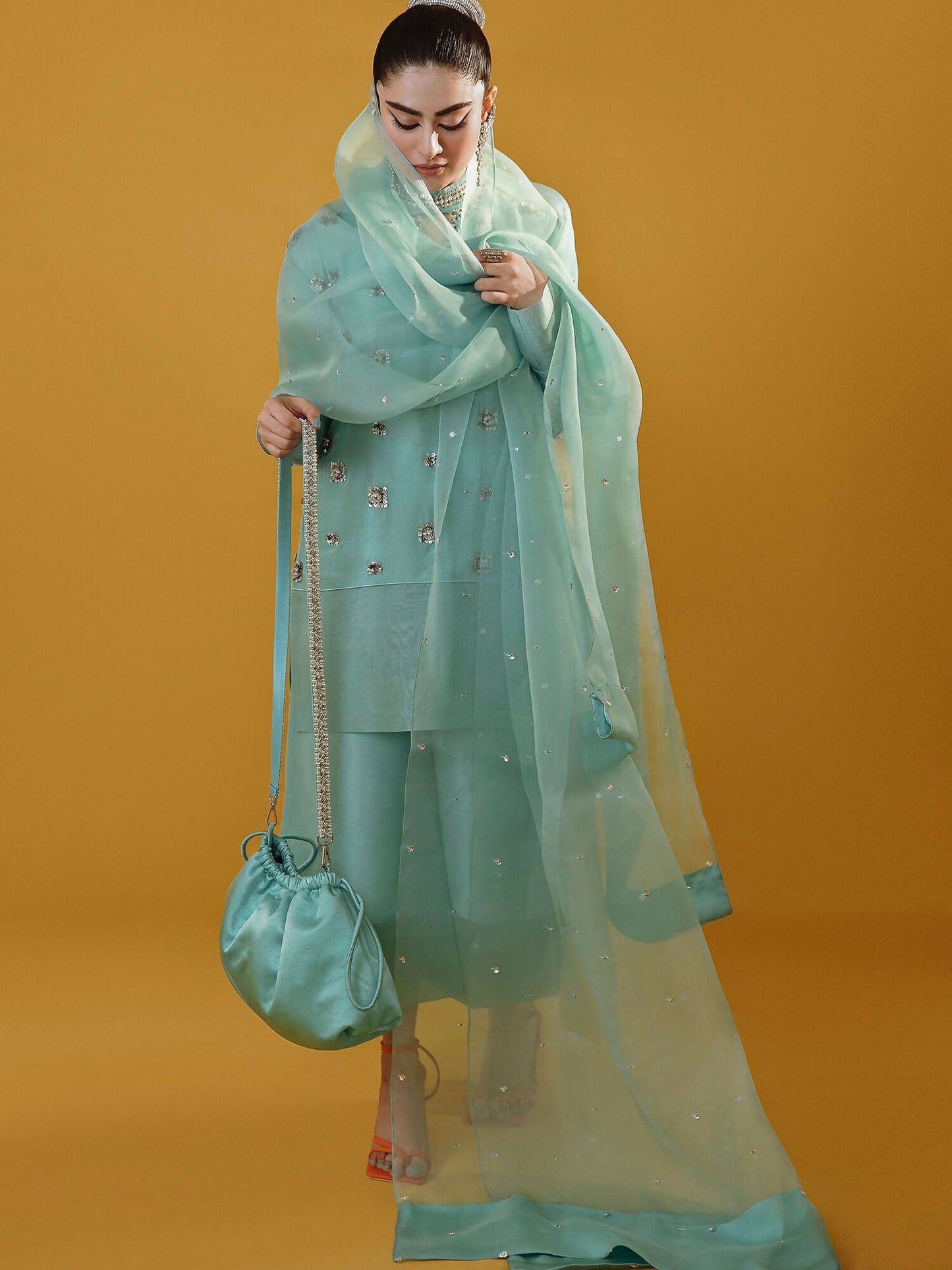 Aqua embellished raw silk outfit with organza dupatta by Hussain Rehar.