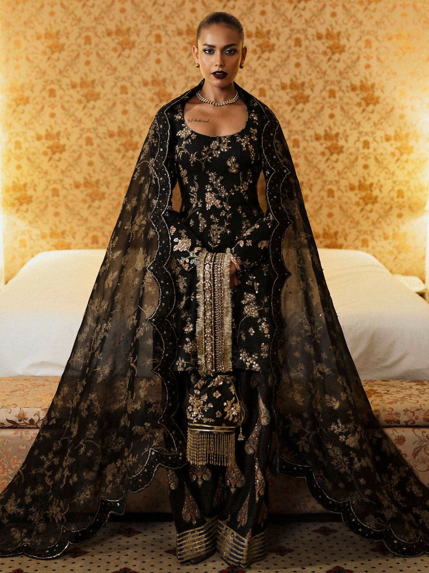 Hussain Rehar stitched 3-piece suit with embellished raw silk shirt, organza dupatta, and shalwar with chanderi silk poncha.