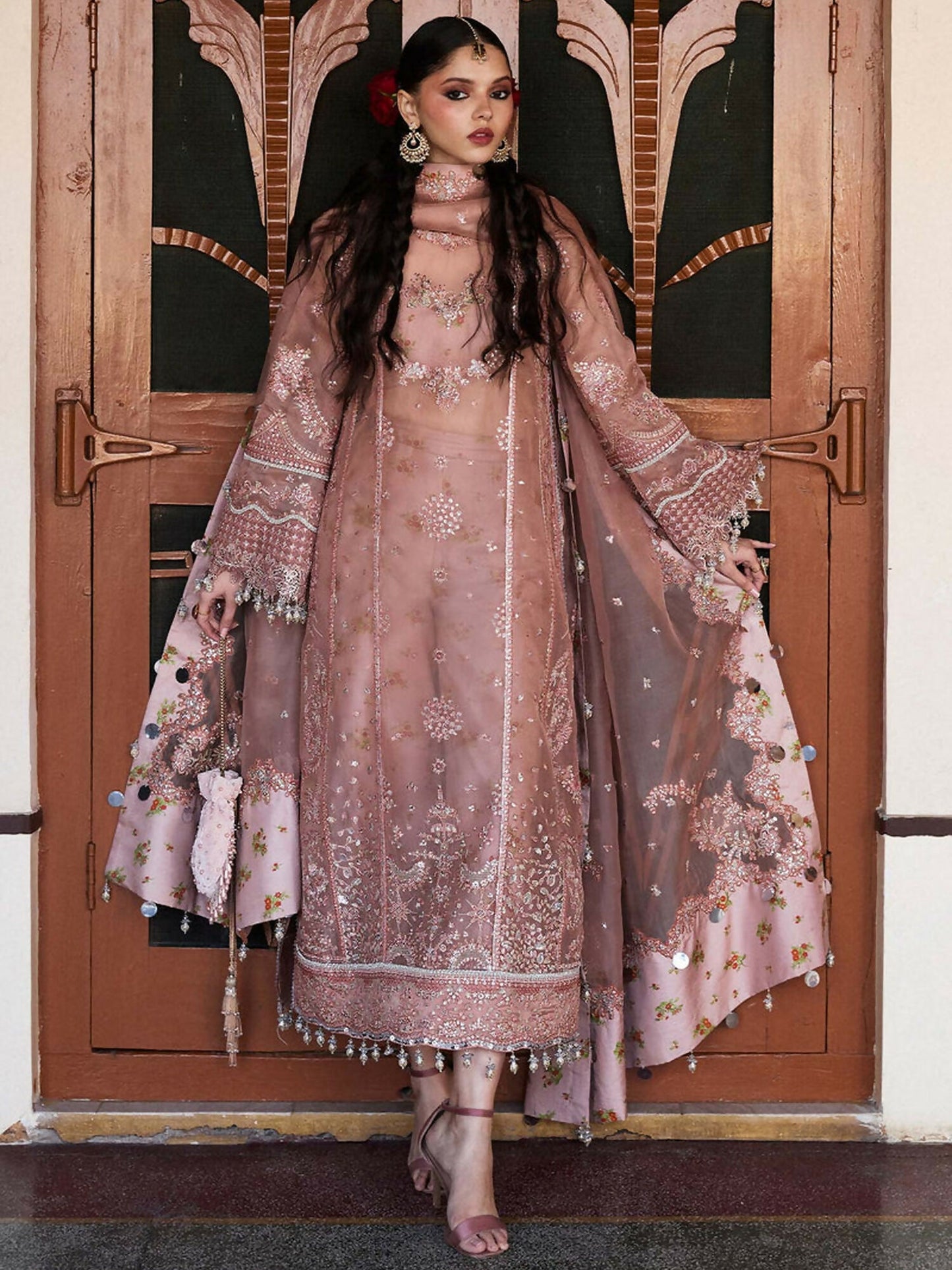 Brownish pink unstitched 3-piece suit featuring embroidered organza shirt, printed Thai silk inner, organza dupatta with embroidered borders, and floral printed Korean raw silk trouser