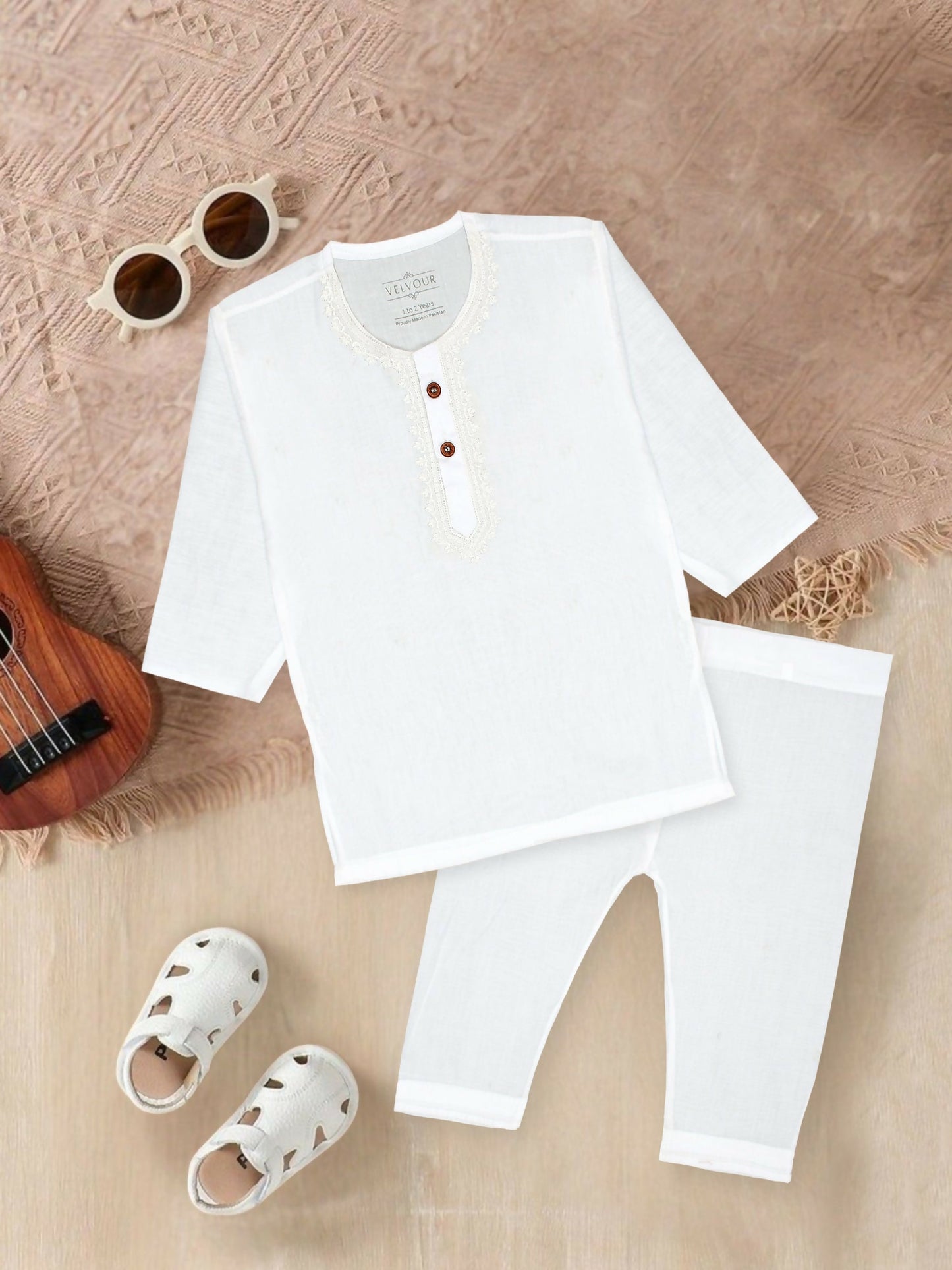 Embroidered stitched cotton kurta pajama suit with round neck, full sleeves, and regular fit, ideal for traditional and festive occasions