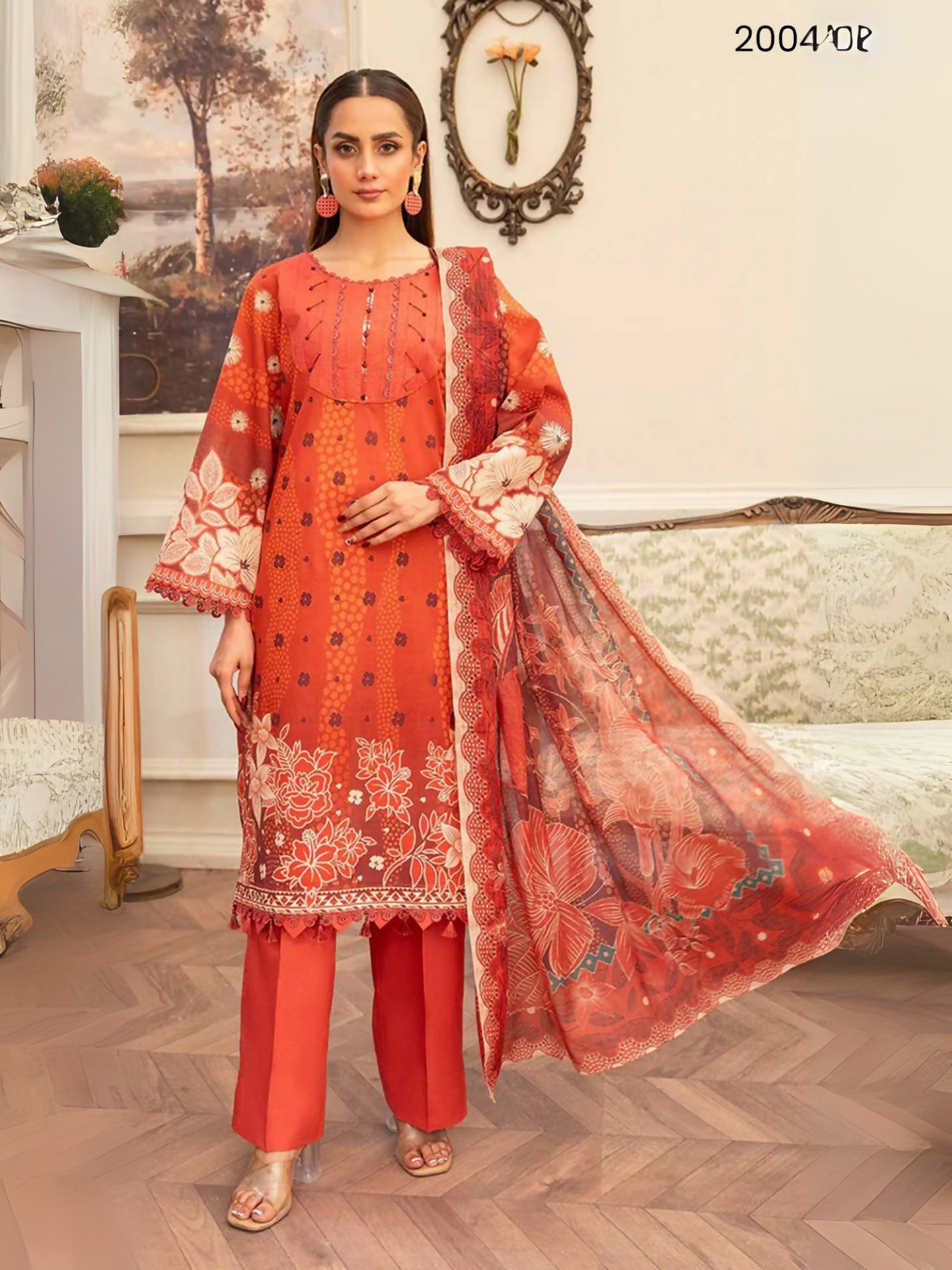 Rust orange unstitched 3-piece lawn suit by Sitara Studio featuring printed shirt with white florals, dyed trouser, and digital printed dupatta