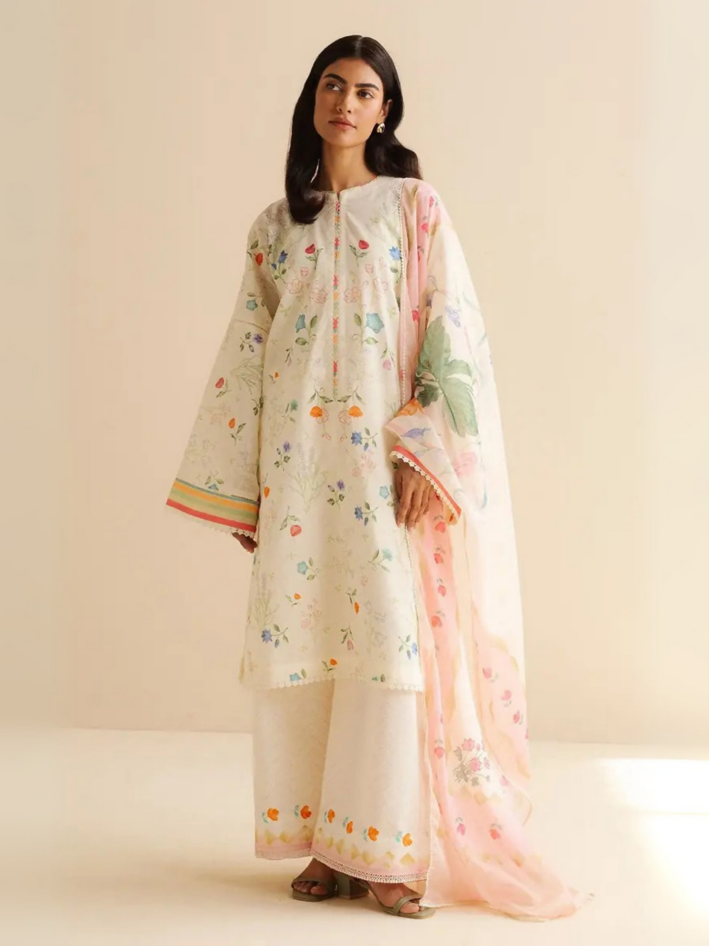 Unstitched 3-piece printed suit with floral lawn shirt, matching cambric trouser, and digitally printed silk dupatta.