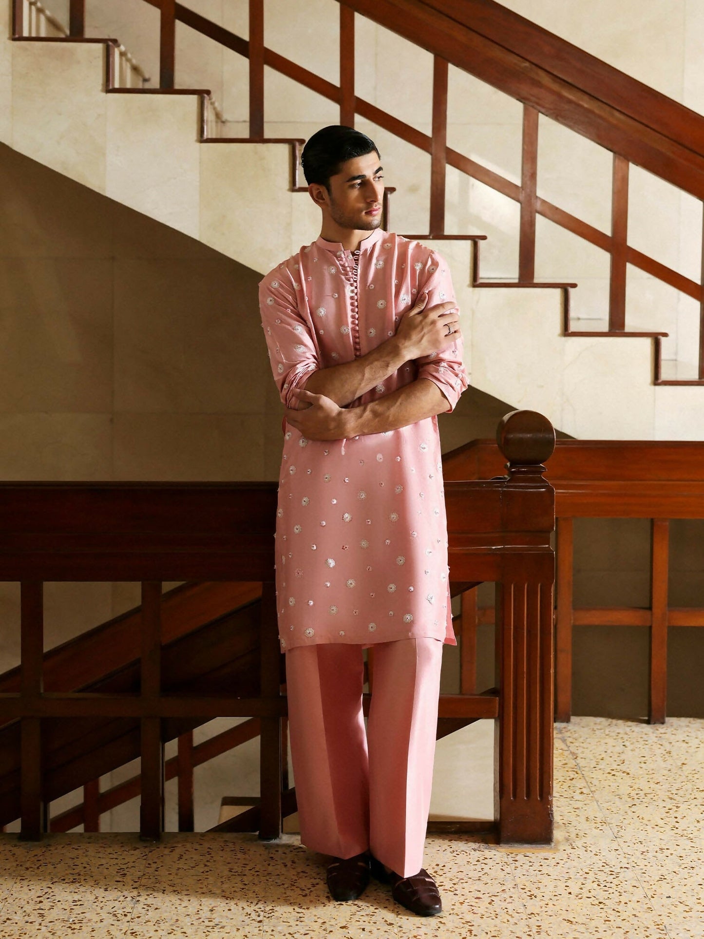 Hussain Rehar coral blush raw silk kurta with tonal floral embroidery and hand embellishments, paired with straight raw silk trousers.