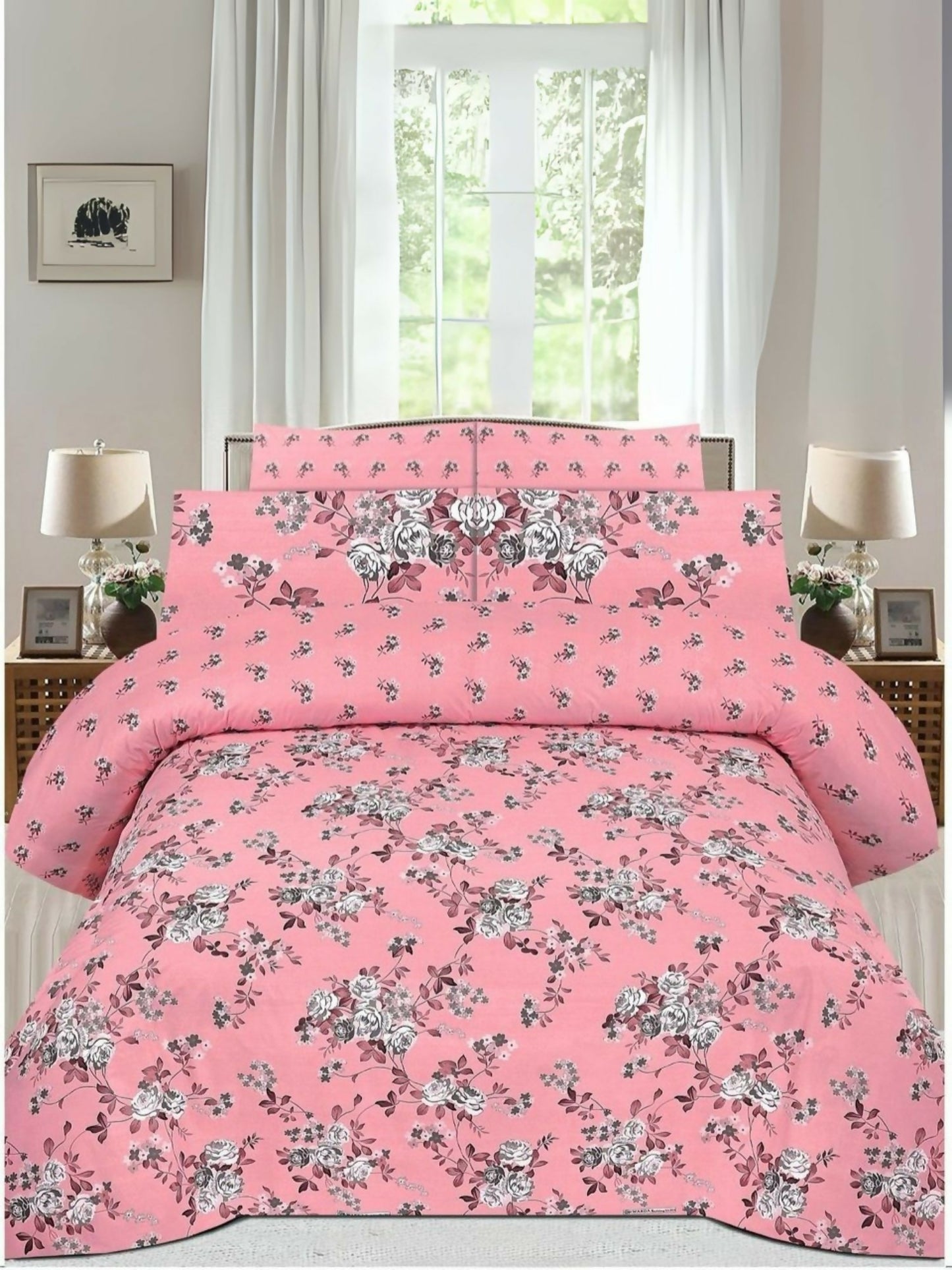Danier 6pcs comforter set in pink with floral design – includes comforter, bedsheet, and four pillow covers.