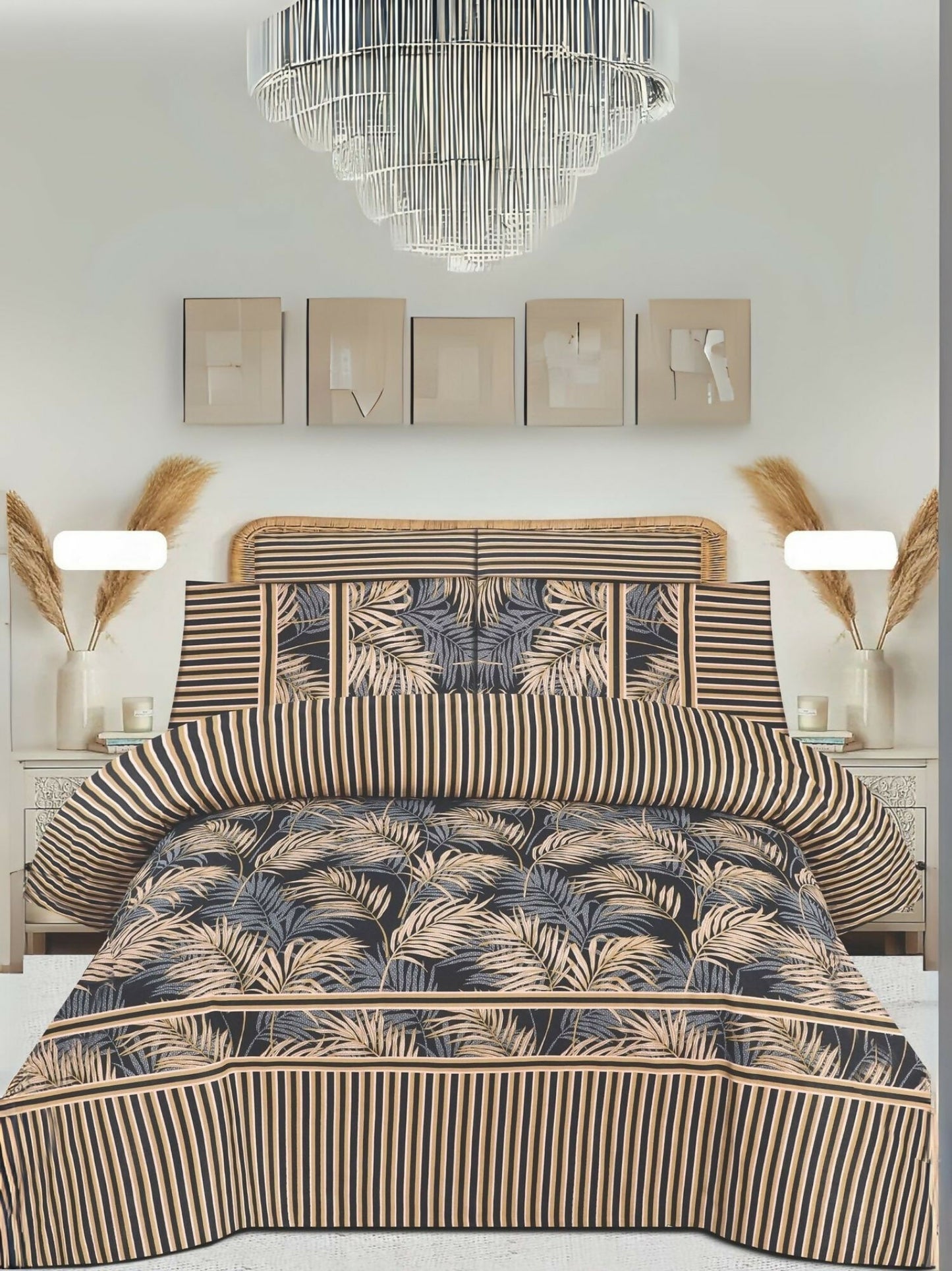 A beige king size bedsheet with black and beige leaf pattern, styled on a bed with matching pillow covers.