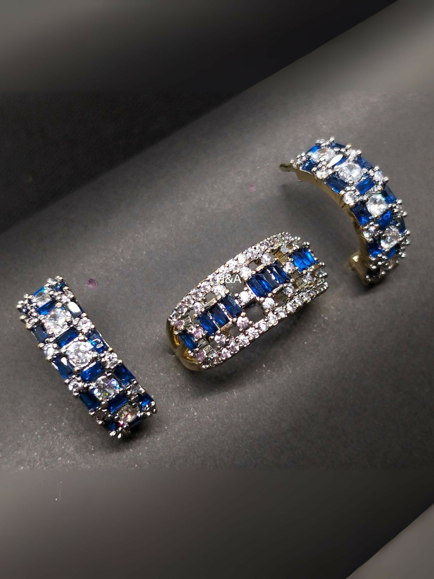 H&A Jewellery two-toned earring and ring set with elegant dual-tone design.