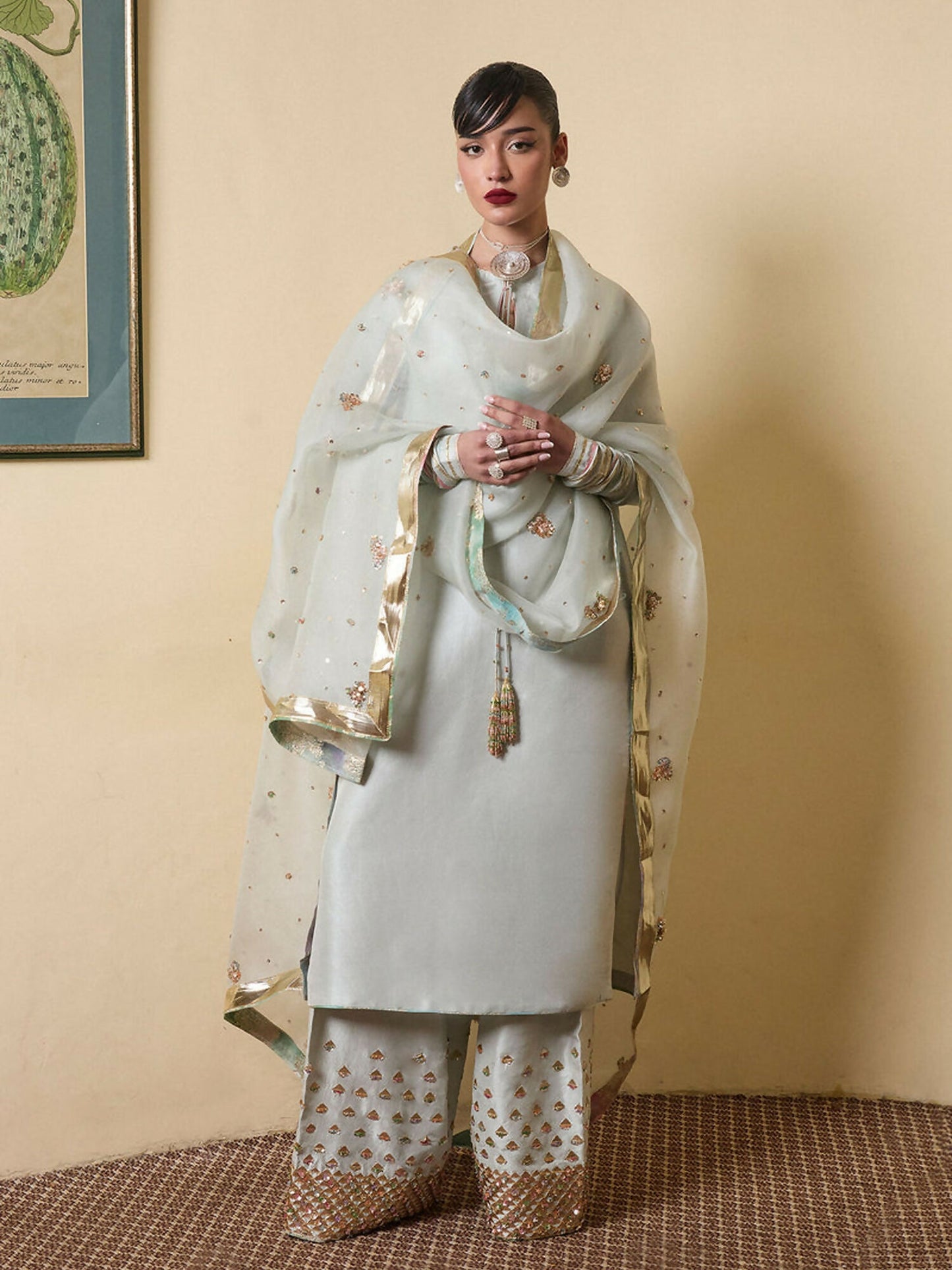Hussain Rehar ice blue raw silk long shirt with choridar sleeves, hand-embellished culottes, and organza dupatta finished with lappa and golden gitian