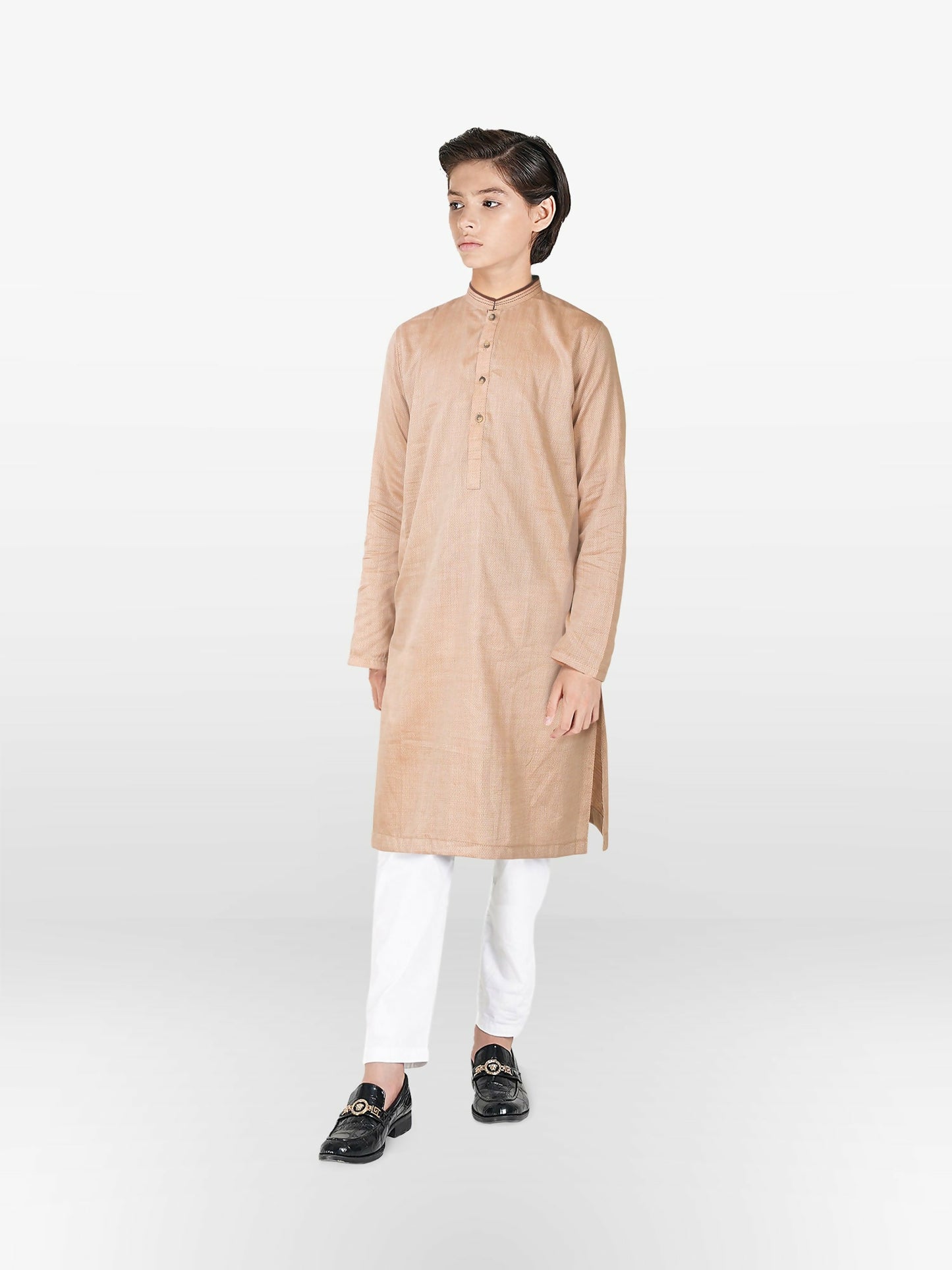 Boy wearing cotton stitched kurta with mandarin collar, full sleeves, and regular fit – ethnic wear outfit for kids.