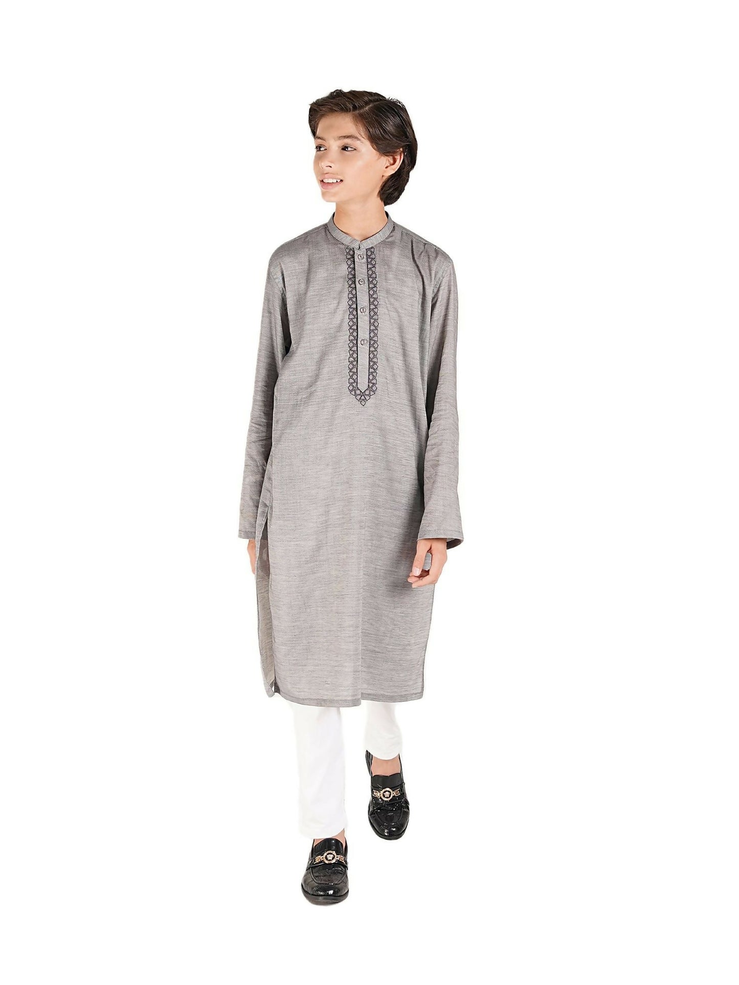 Boy wearing cotton stitched kurta with mandarin collar, full sleeves, regular fit, and delicate embroidery along the placket – ethnic wear outfit for kids.