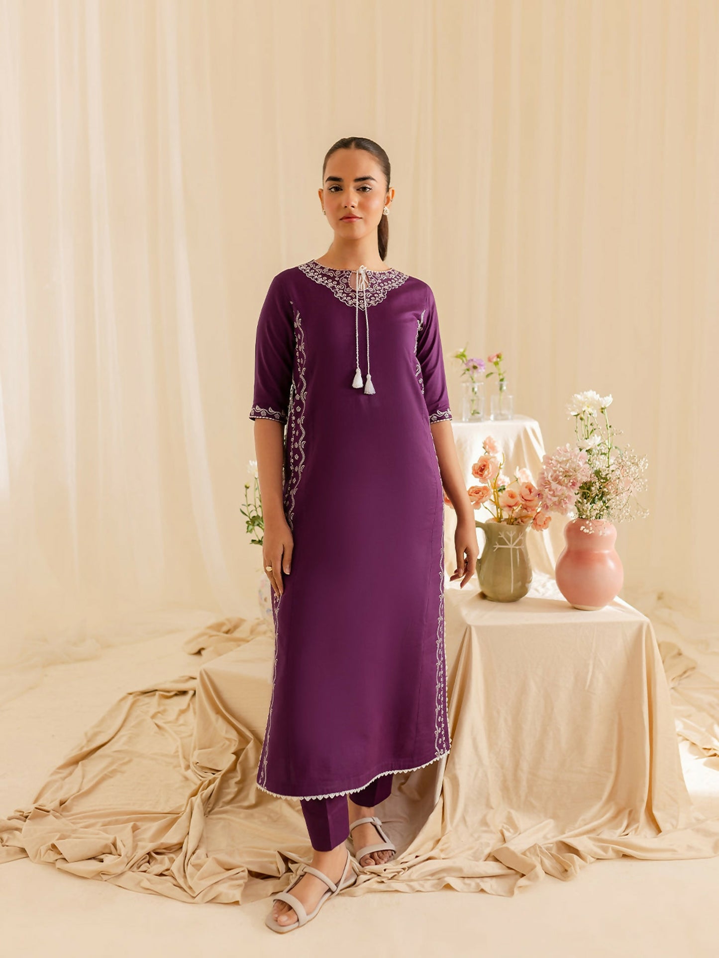 Mahnur stitched 2-piece pret suit featuring a lawn embroidered shirt with classic detailing, paired with a plain trouser.
