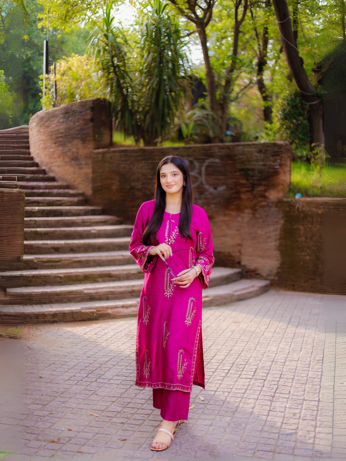 Stitched 2-piece suit with heavily embroidered summer lilen shirt and plain trouser from Tehzeeb Libas.