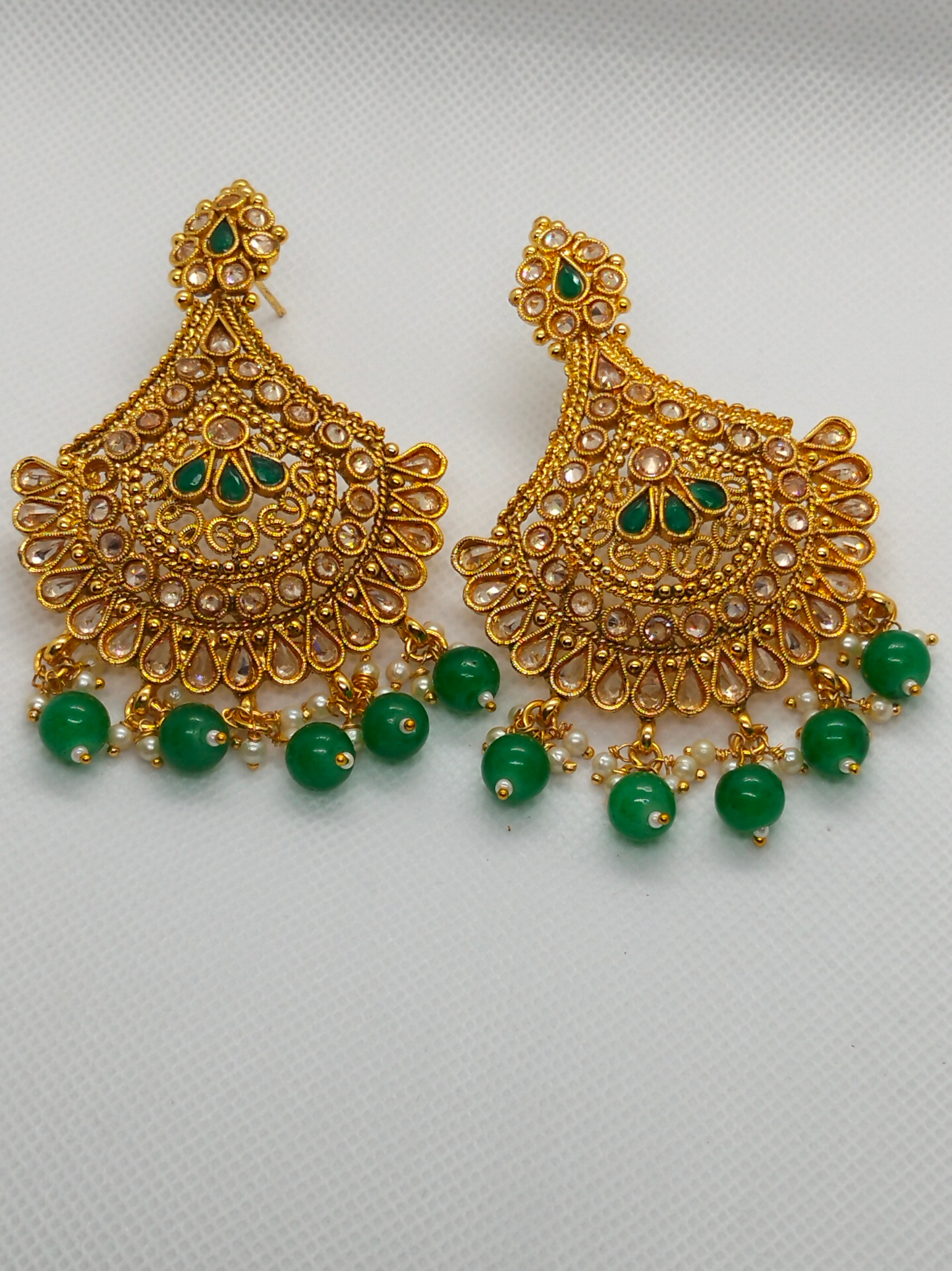 H&A Jewellery one carat traditional gold earrings with semi-precious stones and green dangling pearls.
