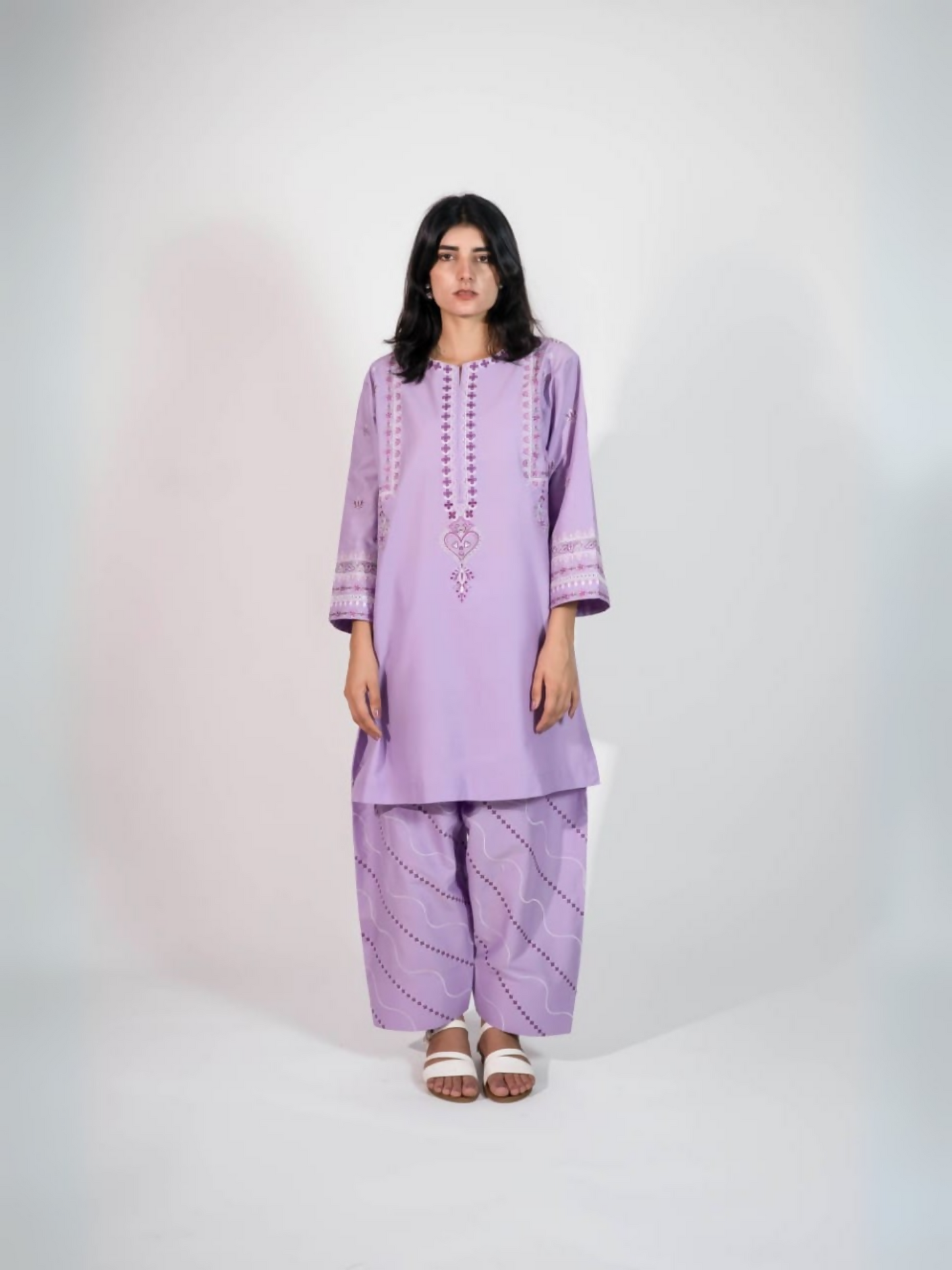 Trends Forever Karam Collection purple lawn stitched 2-piece suit featuring an embroidered shirt and embroidered shalwar for an elegant and polished appearance.