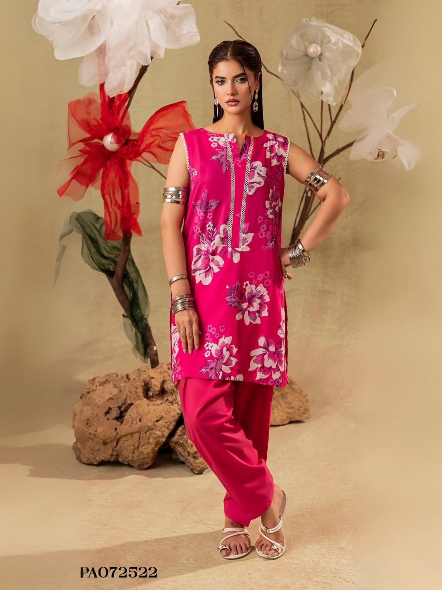 Unstitched 2-piece suit with floral printed shirt on pink base and dyed trouser, perfect for casual wear.