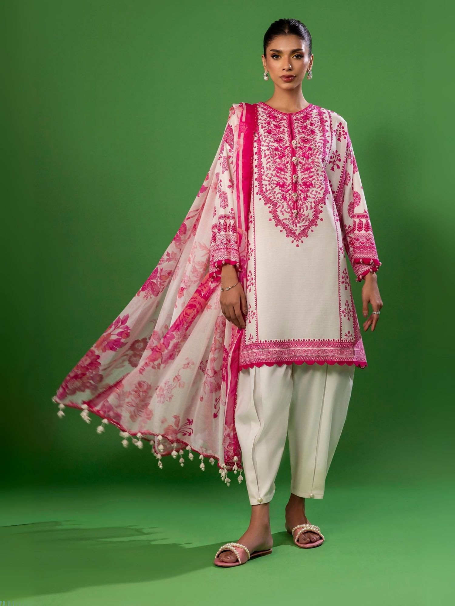 Unstitched 3-piece suit by Sana Safinaz with embroidered lawn shirt, floral printed chiffon dupatta, and plain cotton trouser.