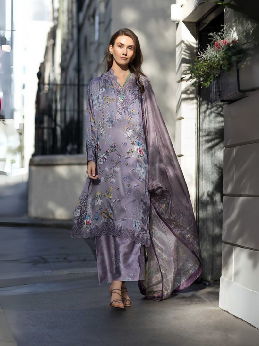 Unstitched 3-piece satin suit with printed shirt, embroidered organza neckline and daman patches, printed satin trouser, and a printed silk dupatta, displayed without additional accessories.