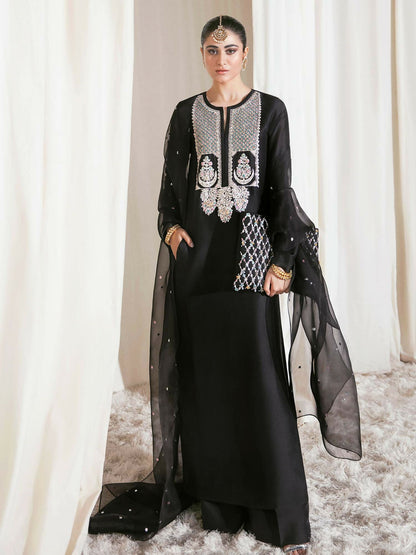 Hussain Rehar raw silk shirt with naqshi, mukesh, and multicolored pipe embellishments, paired with raw silk palazzo pants and sequin-sprayed organza dupatta.