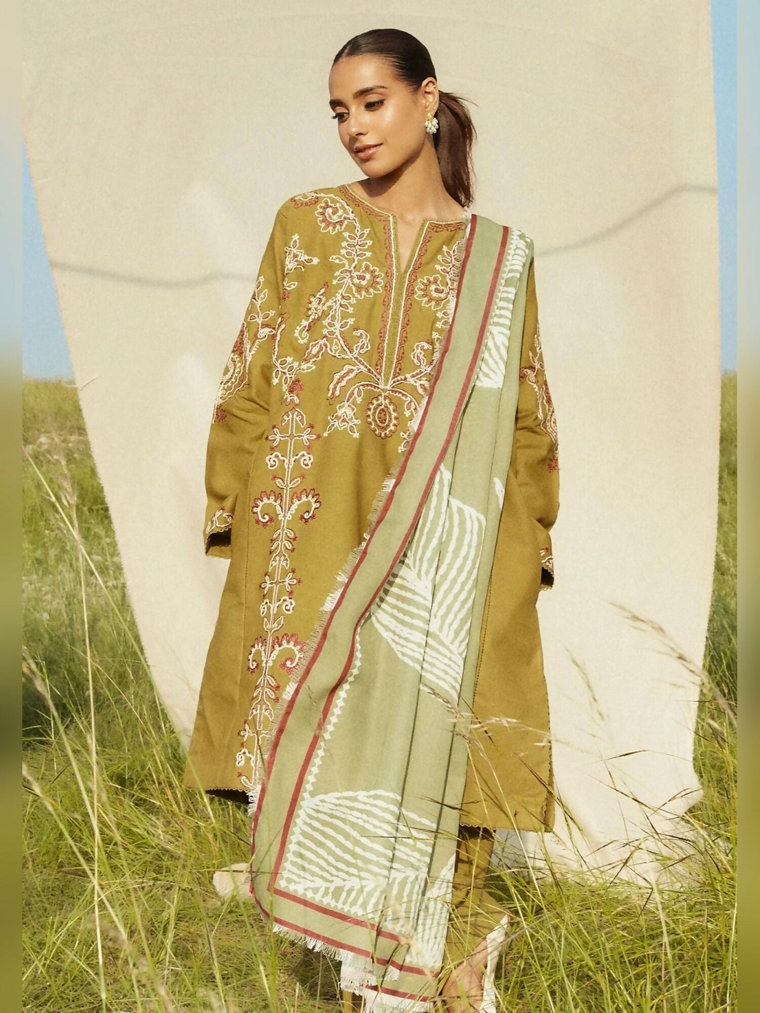 Olive green embroidered khaddar unstitched 3-piece suit with printed shawl by Zara Shahjahan.
