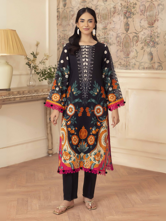 Woman wearing a black 2 piece unstitched lawn suit with colorful printed shirt and plain dyed cotton trouser.