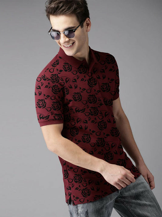 Maroon polo shirt for men with black floral design – comfortable and stylish casual wear made from cotton pique fabric.