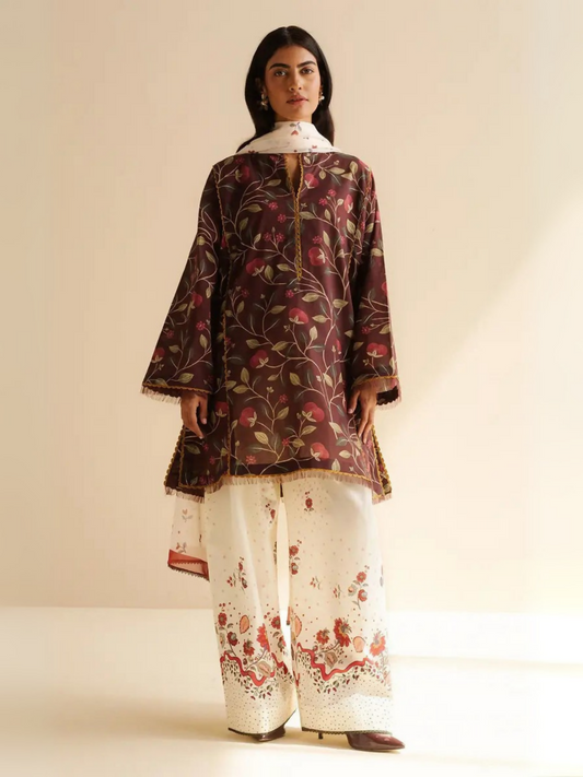 Unstitched 3-piece printed suit with printed lawn shirt, patterned cambric trouser, and simple silk dupatta.