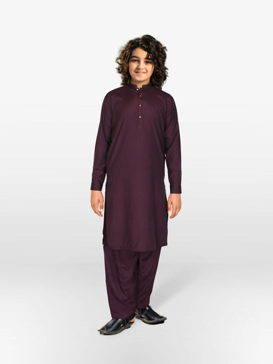 Boy wearing stitched cotton kurta shalwar suit with front button detailing, mandarin collar, full sleeves, and regular fit, ideal for festive and traditional occasions