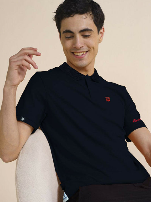 Men’s Jupiter polo with textured collar, red rose embroidery on chest, embroidered detailing on left arm, crafted from soft viscose-cotton blend.