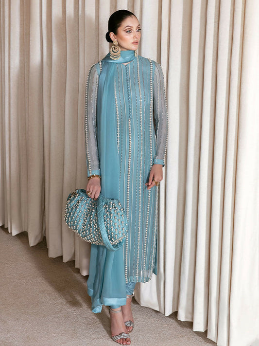 Hussain Rehar ice blue organza shirt with pearl and Swarovski embellishments, raw silk chooridaar, and chiffon dupatta