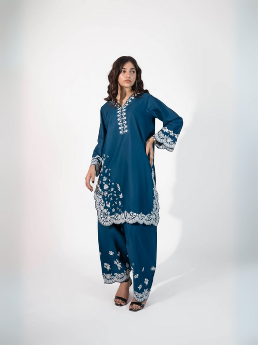 Trends Forever Karam Collection blue lawn stitched 2-piece suit featuring an embroidered shirt and embroidered shalwar, displayed against a minimal backdrop.
