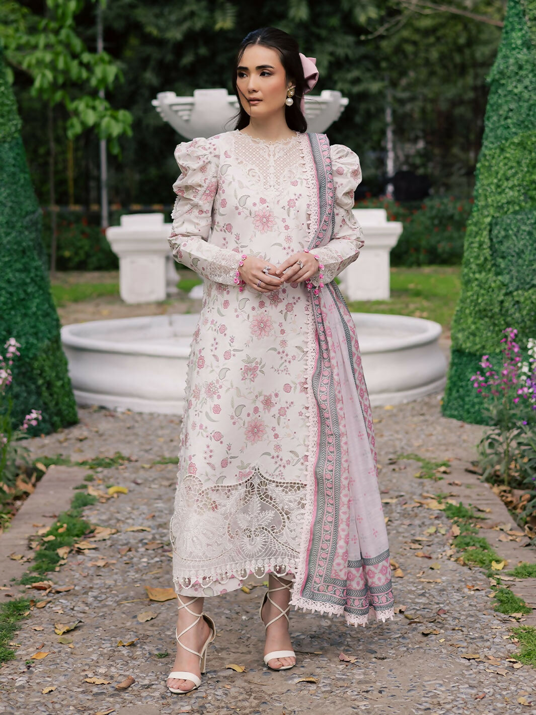Unstitched 3-piece suit with printed lawn shirt, embroidered neckline and borders, printed monark dupatta, and printed cambric trouser.
